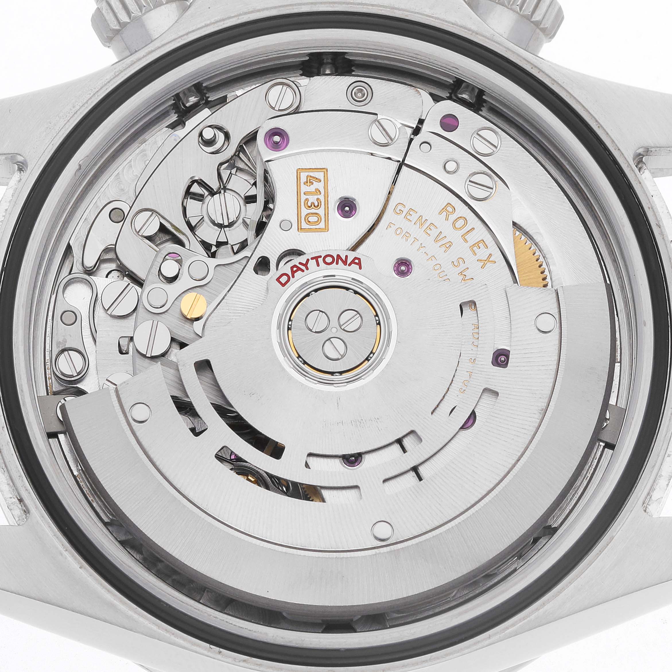 This image shows the movement of a Rolex Daytona 116520 Men
s Stainless Steel White Dial watch from a rear angle, highlighting the intricate mechanisms inside.