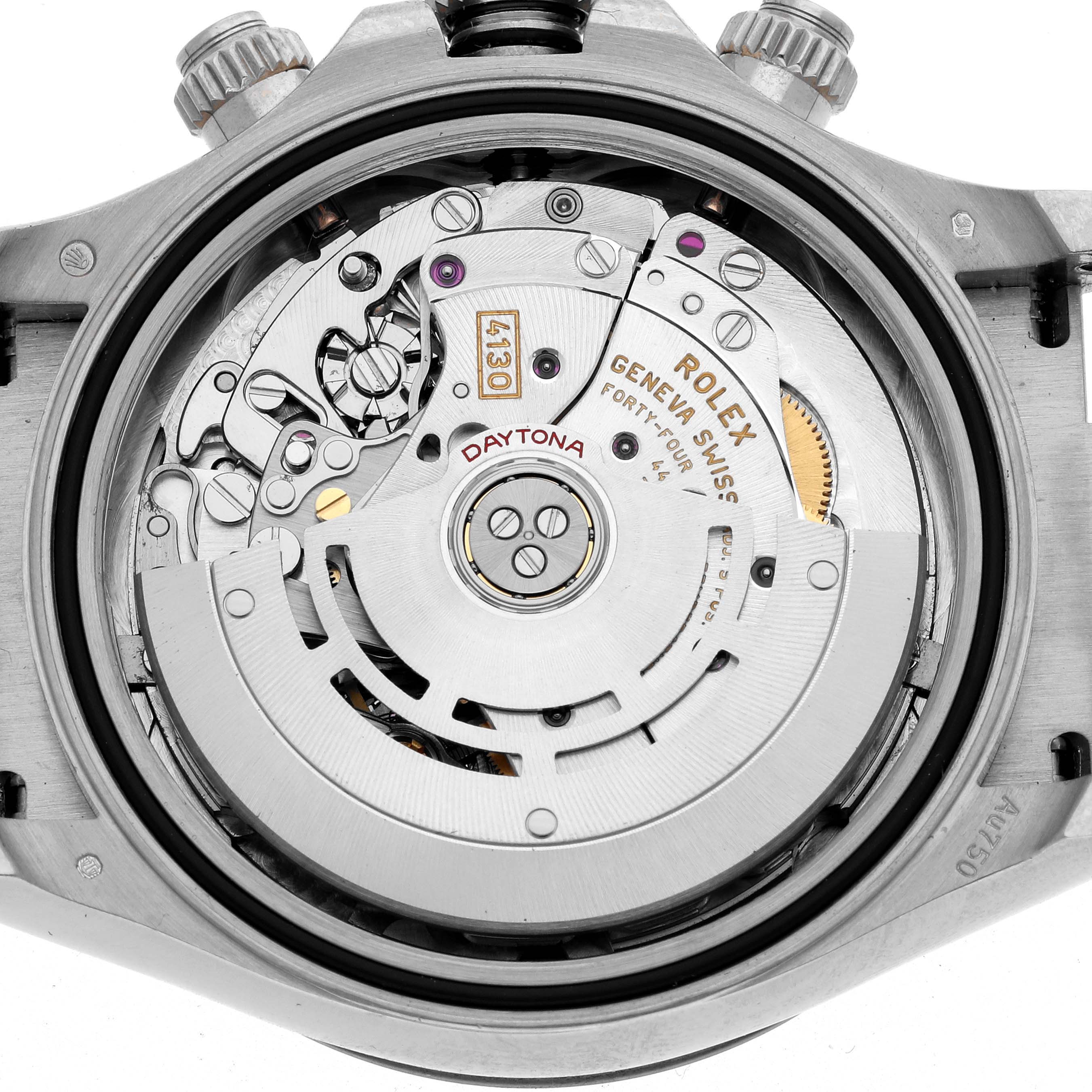 This image shows the movement of a Rolex Daytona 116519 Men
s White Gold Black Dial watch from the back, displaying gears and inscriptions.
