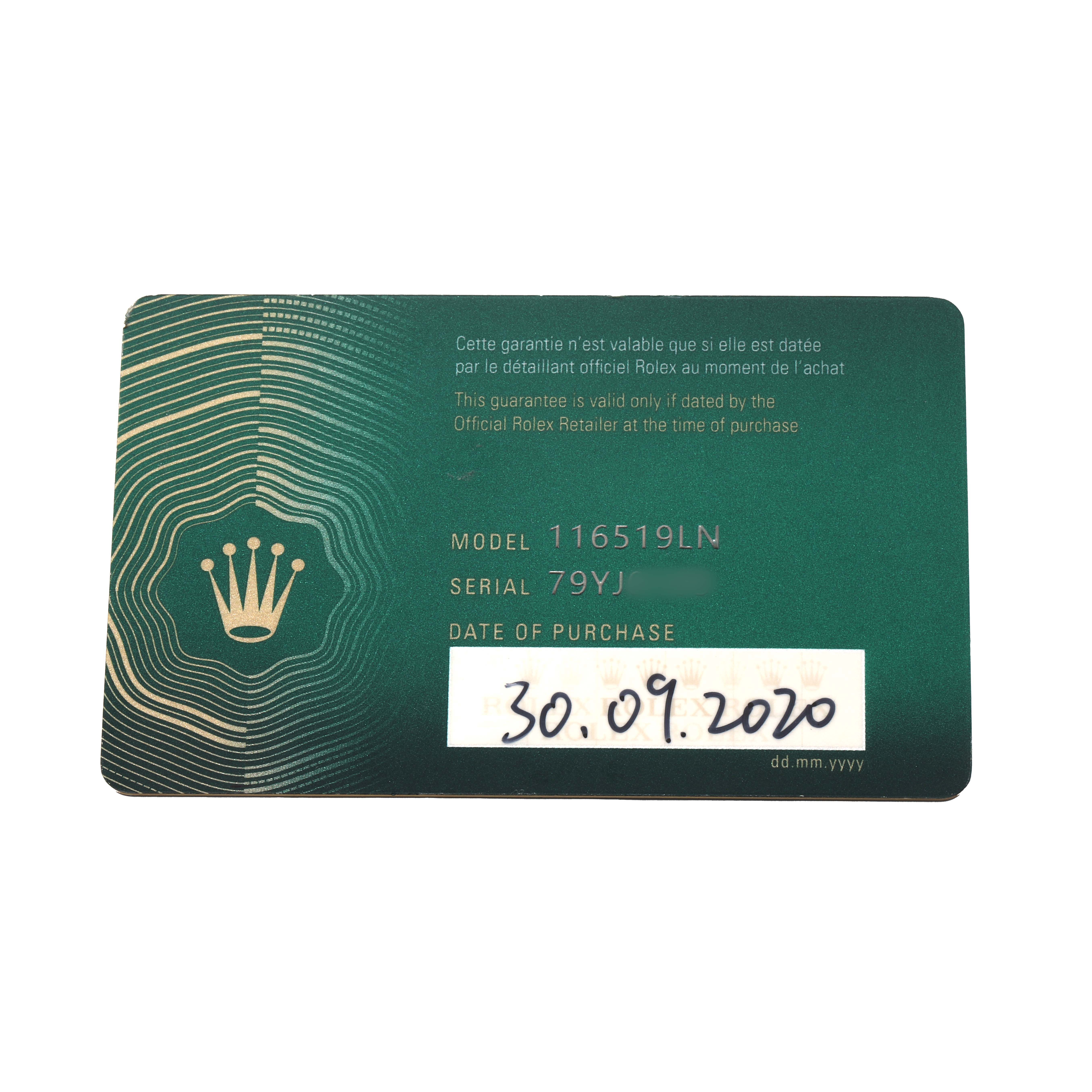 This image shows a warranty card for the Rolex Daytona 116519 Men
s White Gold Black Dial, displaying model and serial numbers and purchase date.