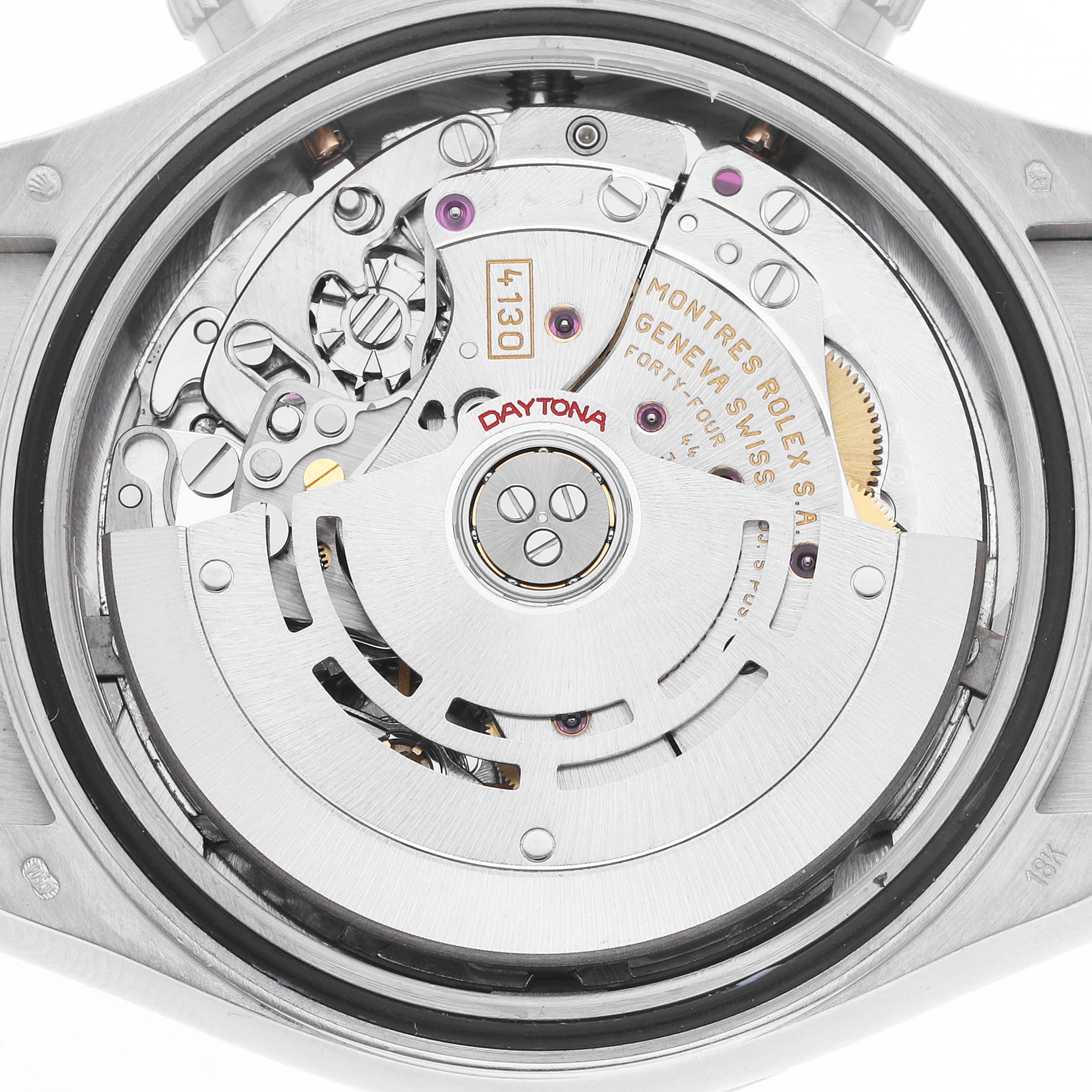 The image shows the movement of a Rolex Daytona 116519 Men
s White Gold White Dial watch, highlighting the rotor and internal mechanisms from the back.