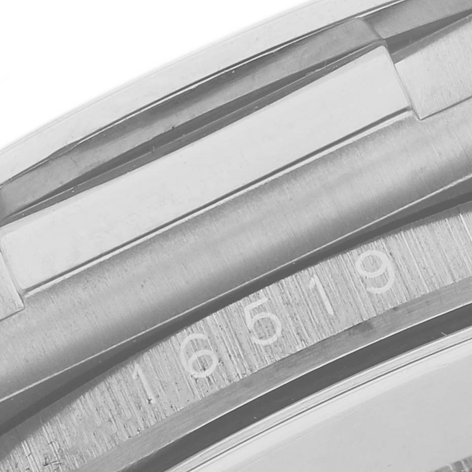 The image shows a close-up of the case and bezel of the Rolex Daytona 16519NG Men's White Gold Mother of Pearl Dial 16519NG Men's White Gold Mother of Pearl Dial watch.