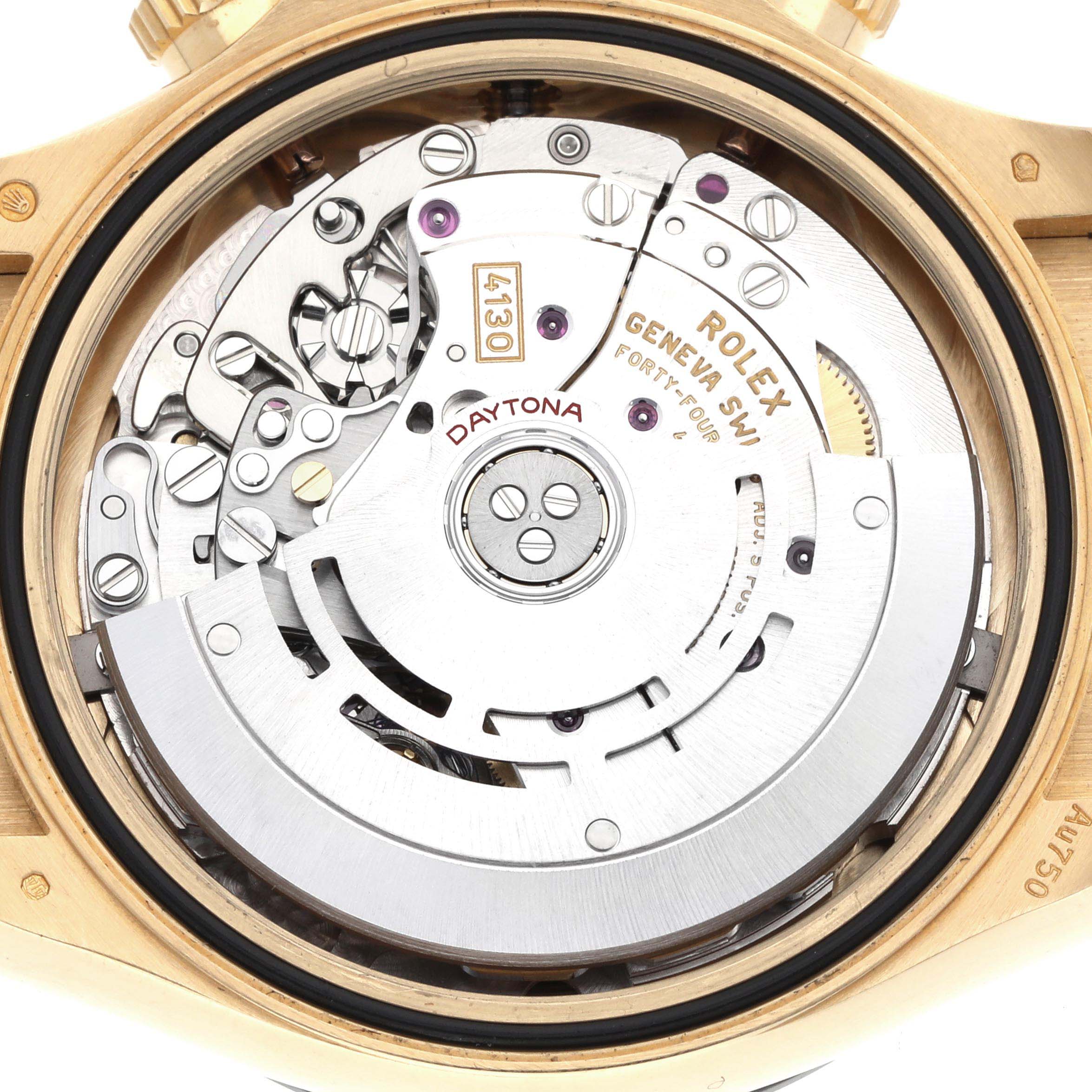 The image shows the movement mechanism of a Rolex Daytona 116518 Men
s Yellow Gold Beige Dial watch from the back, highlighting its intricate components.