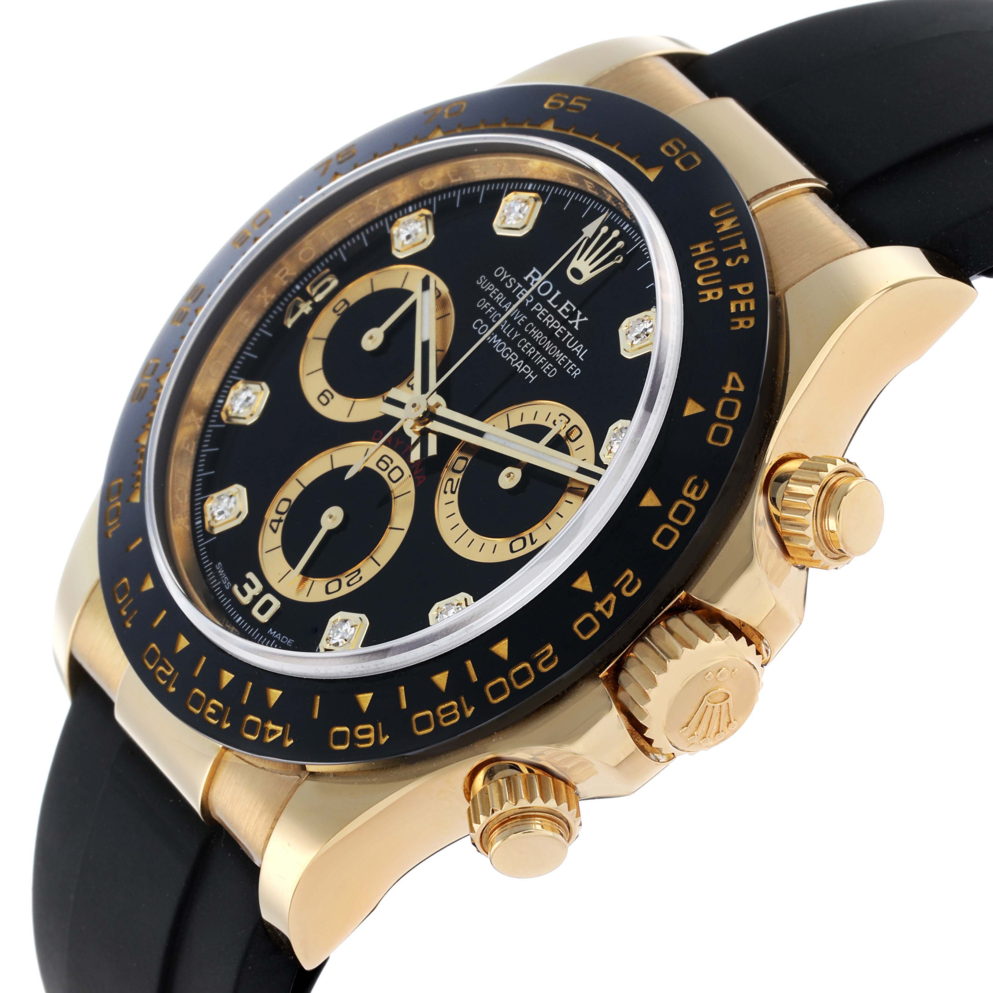 The image shows a side and partial top view of a Rolex Daytona 116518 Men
s Yellow Gold Beige Dial watch, displaying the bezel, dial, and crown.