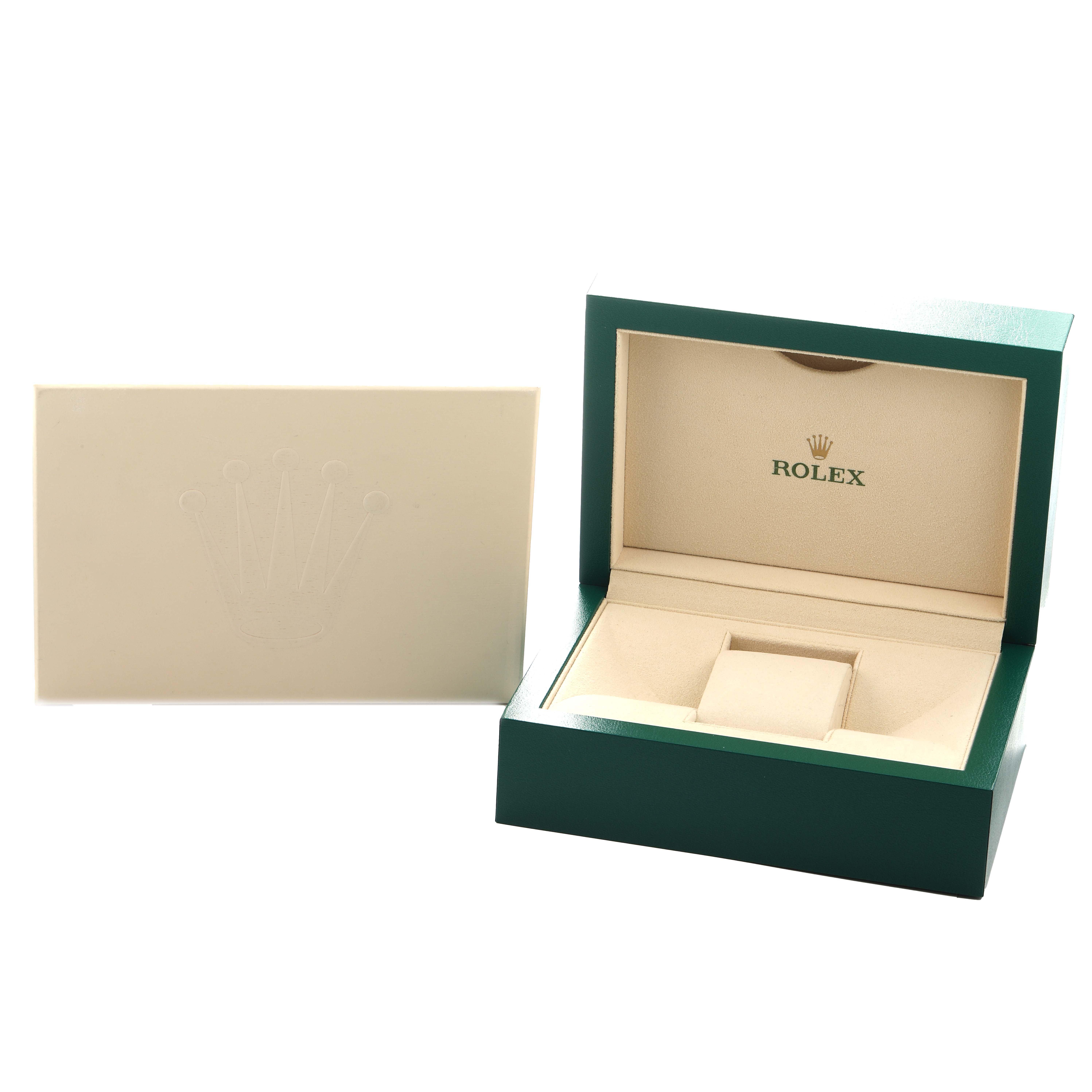 The image shows an open Rolex Oyster Perpetual 124300 Men
s Stainless Steel Green Dial watch box and its cover from a frontal angle, highlighting the interior compartments.