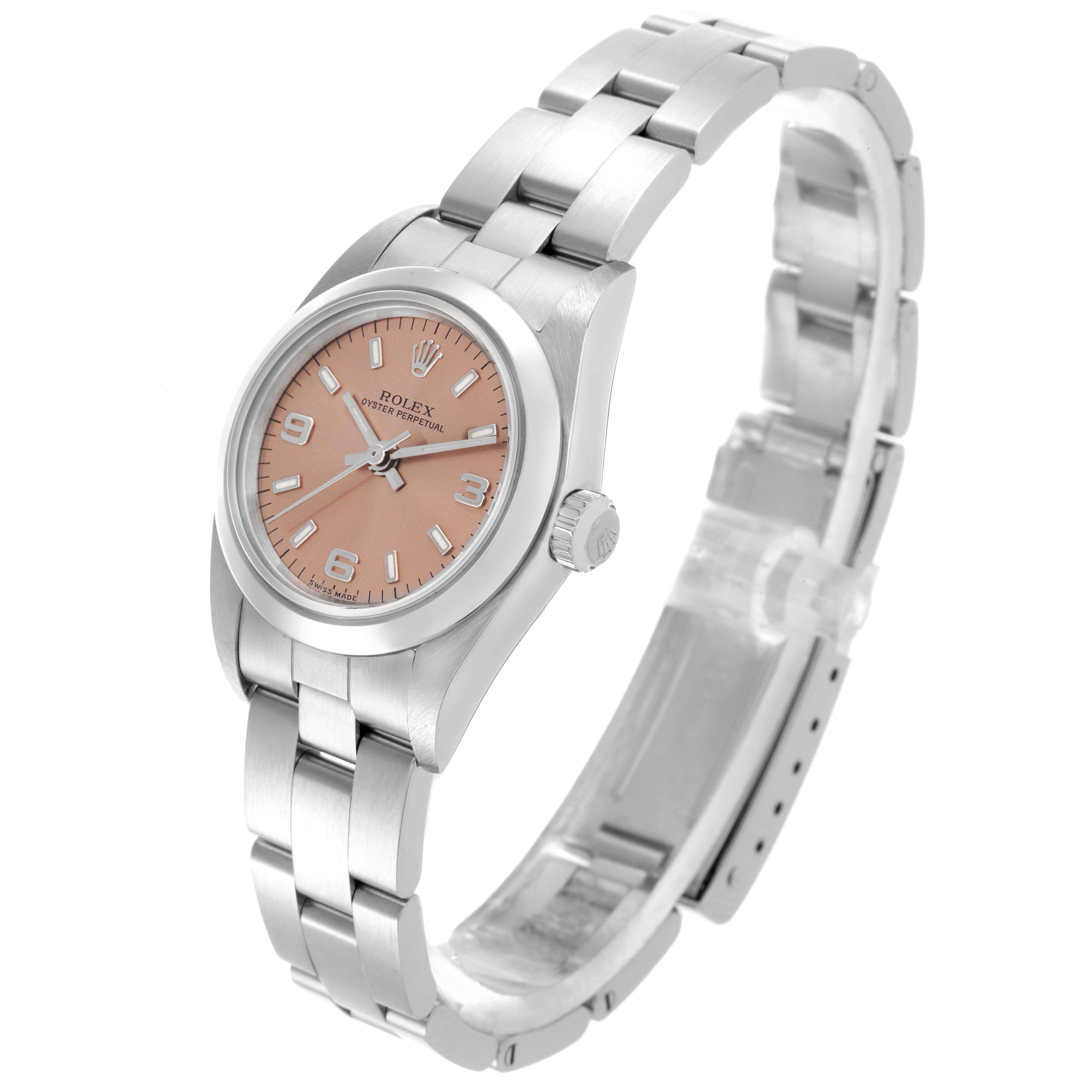 The Rolex Oyster Perpetual 76080 Women's Stainless Steel Pink Dial 76080 Women's Stainless Steel Pink Dial watch is shown at a three-quarter angle, displaying the dial, case, crown, and bracelet.