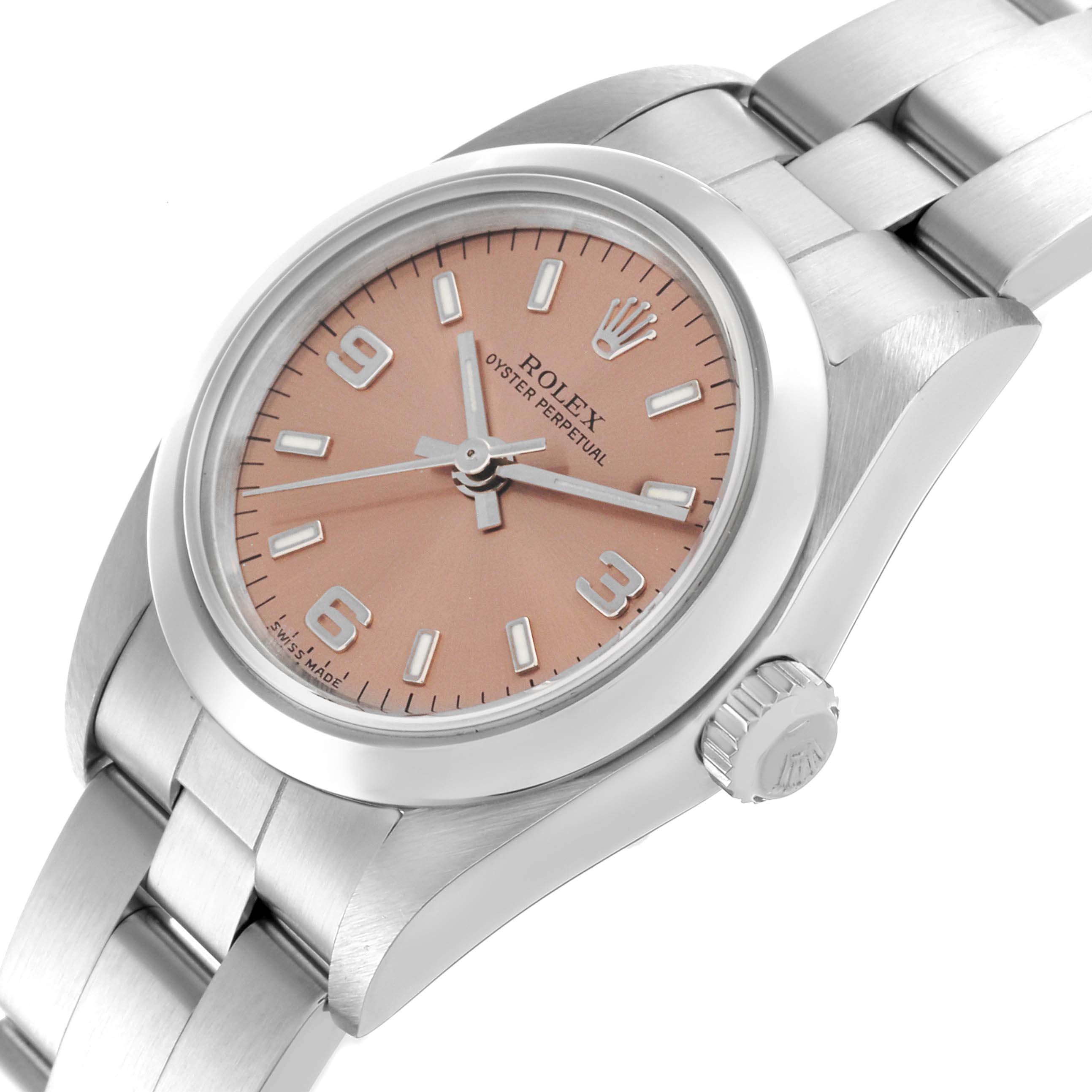 The Rolex Oyster Perpetual 76080 Women's Stainless Steel Pink Dial 76080 Women's Stainless Steel Pink Dial watch is shown at a slight angle, displaying the face, bezel, and part of the bracelet.