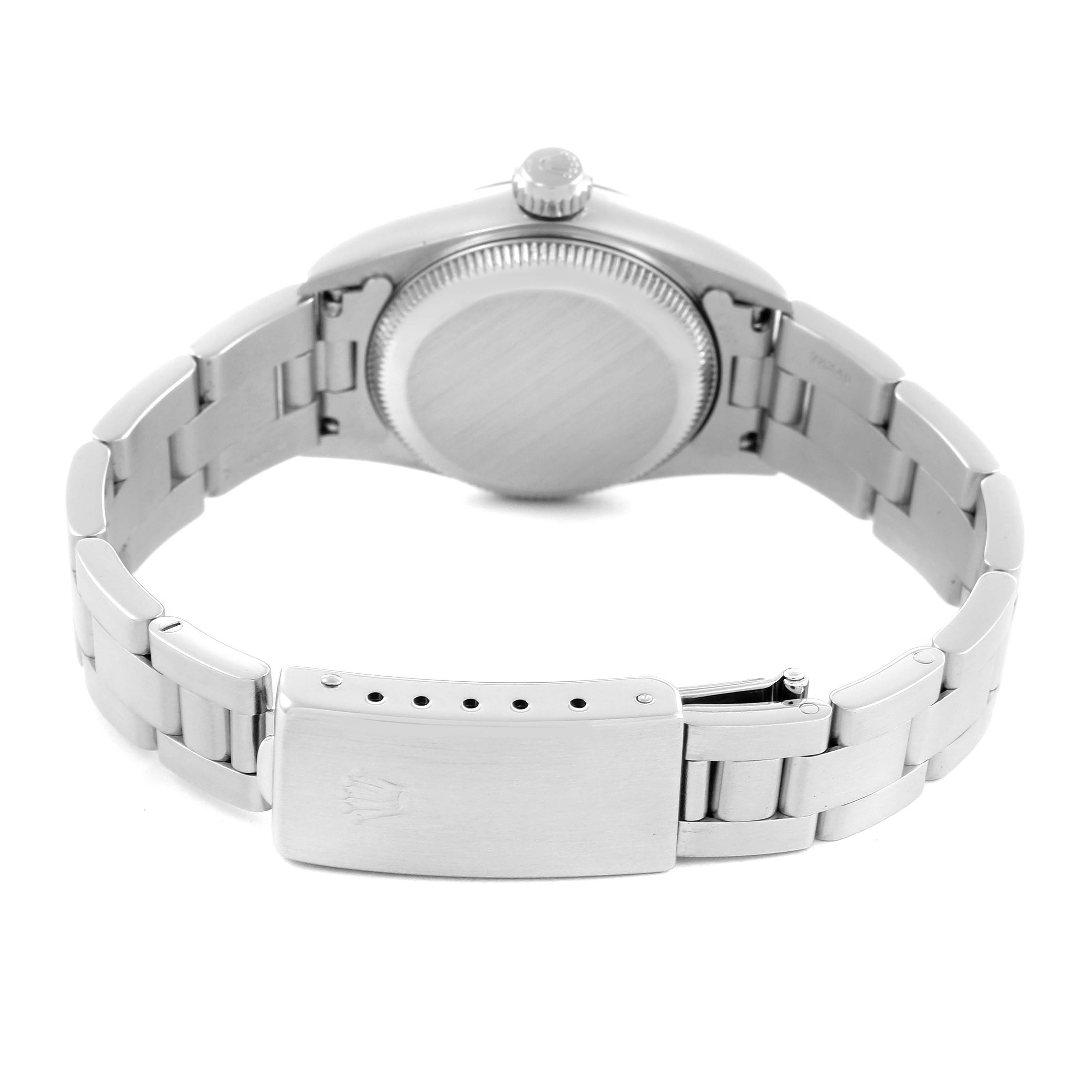 The image shows a Rolex Oyster Perpetual 67194 Women's Stainless Steel Black Dial 67194 Women's Stainless Steel Black Dial watch from the back, displaying its clasp and bracelet links.