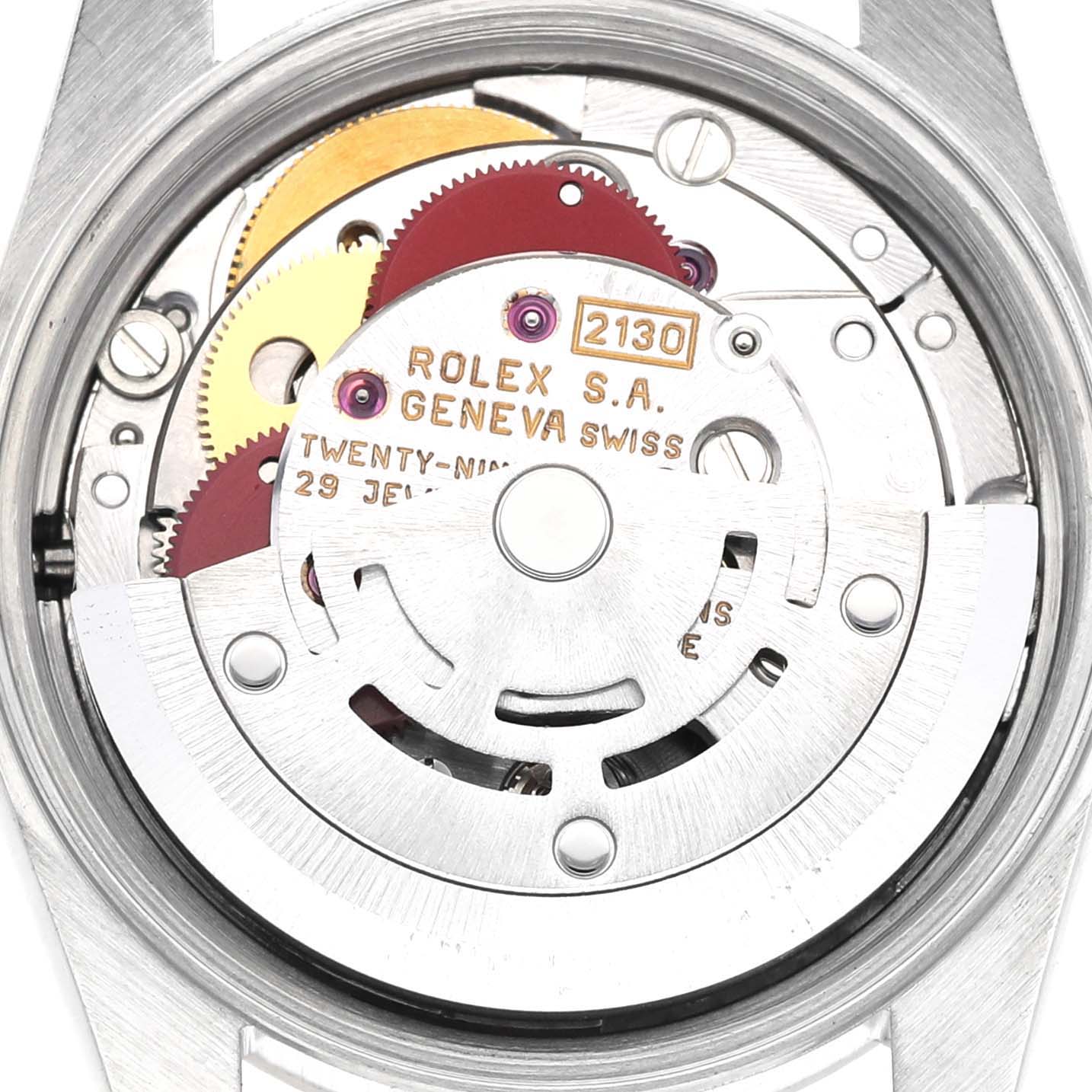 The image shows the movement of a Rolex Oyster Perpetual 67194 Women's Stainless Steel Black Dial 67194 Women's Stainless Steel Black Dial watch, focusing on the intricate gears and rotor from the back.