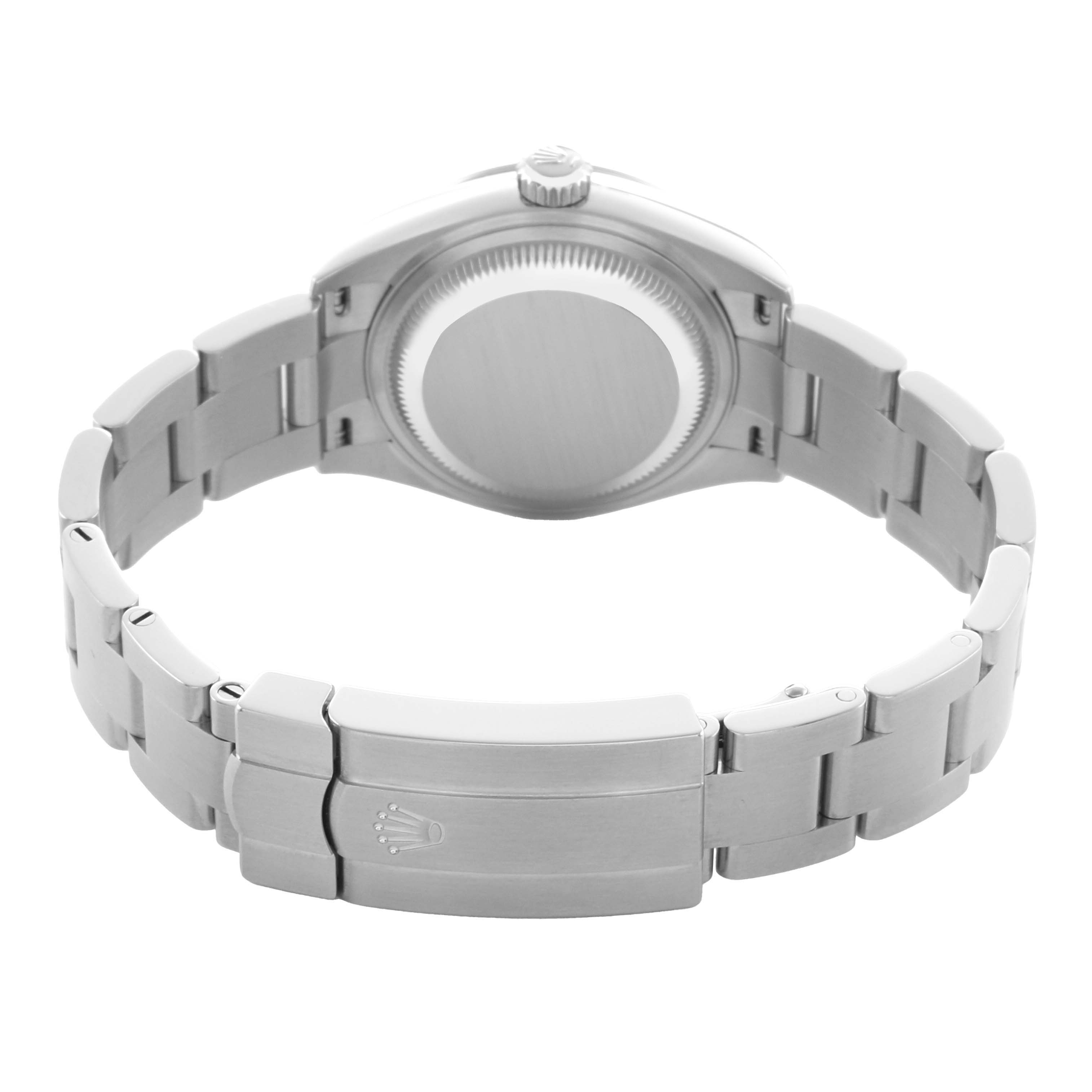 The image shows the back view of a Rolex Oyster Perpetual 276200 Women
s Stainless Steel Green Dial watch, highlighting the case back and bracelet clasp.