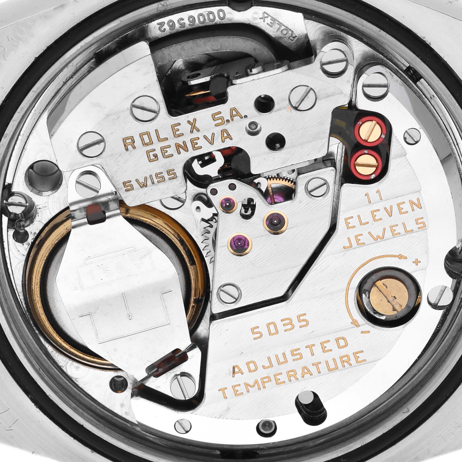 The image shows the internal mechanism of a Rolex Oysterquartz 17000 Men's Stainless Steel Black Dial 17000 Men's Stainless Steel Black Dial, focused on the movement components and inscriptions.