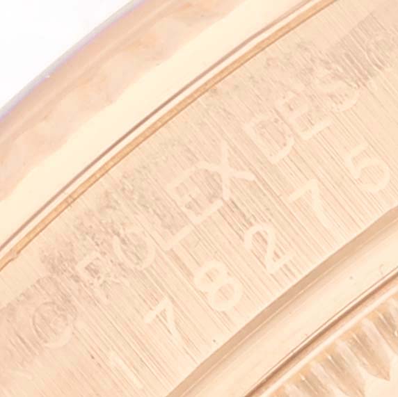 This image shows a close-up of the engraved inner ring (rehaut) of a Rolex President 178275 Women's Rose Gold White Dial 178275 Women's Rose Gold White Dial model watch.