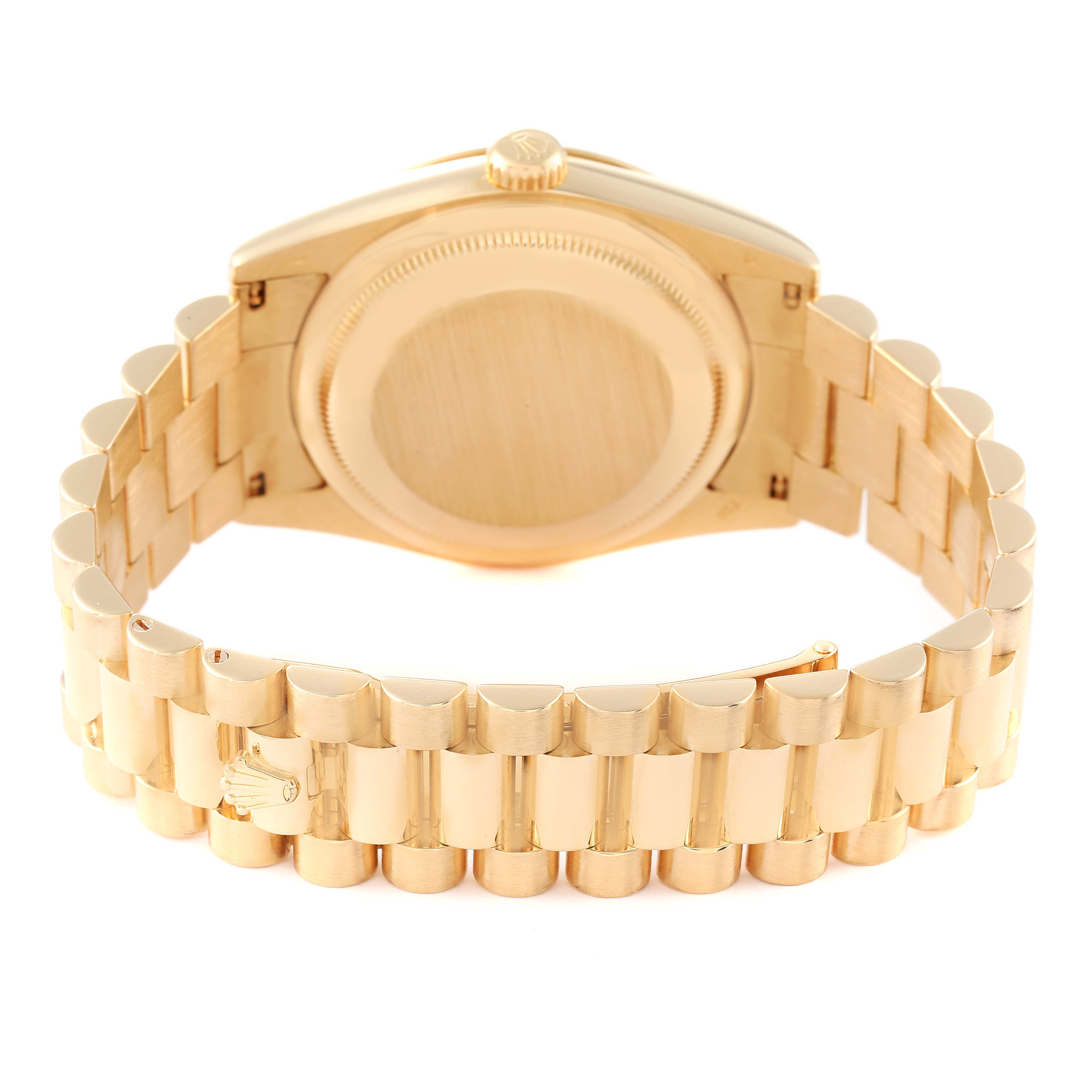 This image shows the back case and bracelet of a Rolex President 118338 Men
s Yellow Gold Champagne Dial 118338 Men
s Yellow Gold Champagne Dial model watch from a rear angle.