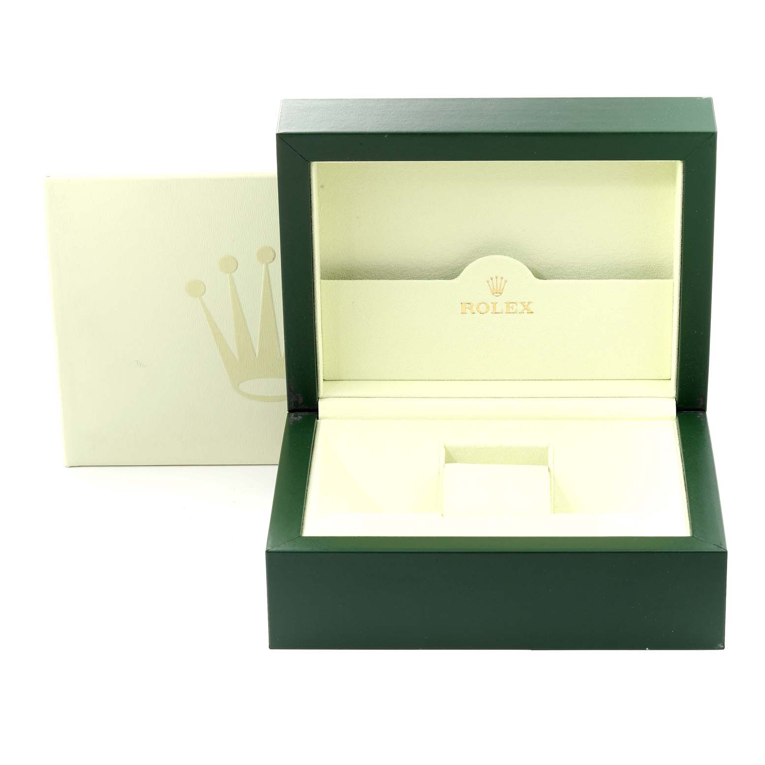 This image shows an open green and cream Rolex President 118338 Men
s Yellow Gold Champagne Dial 118338 Men
s Yellow Gold Champagne Dial model watch box, with the logo and brand name inside.