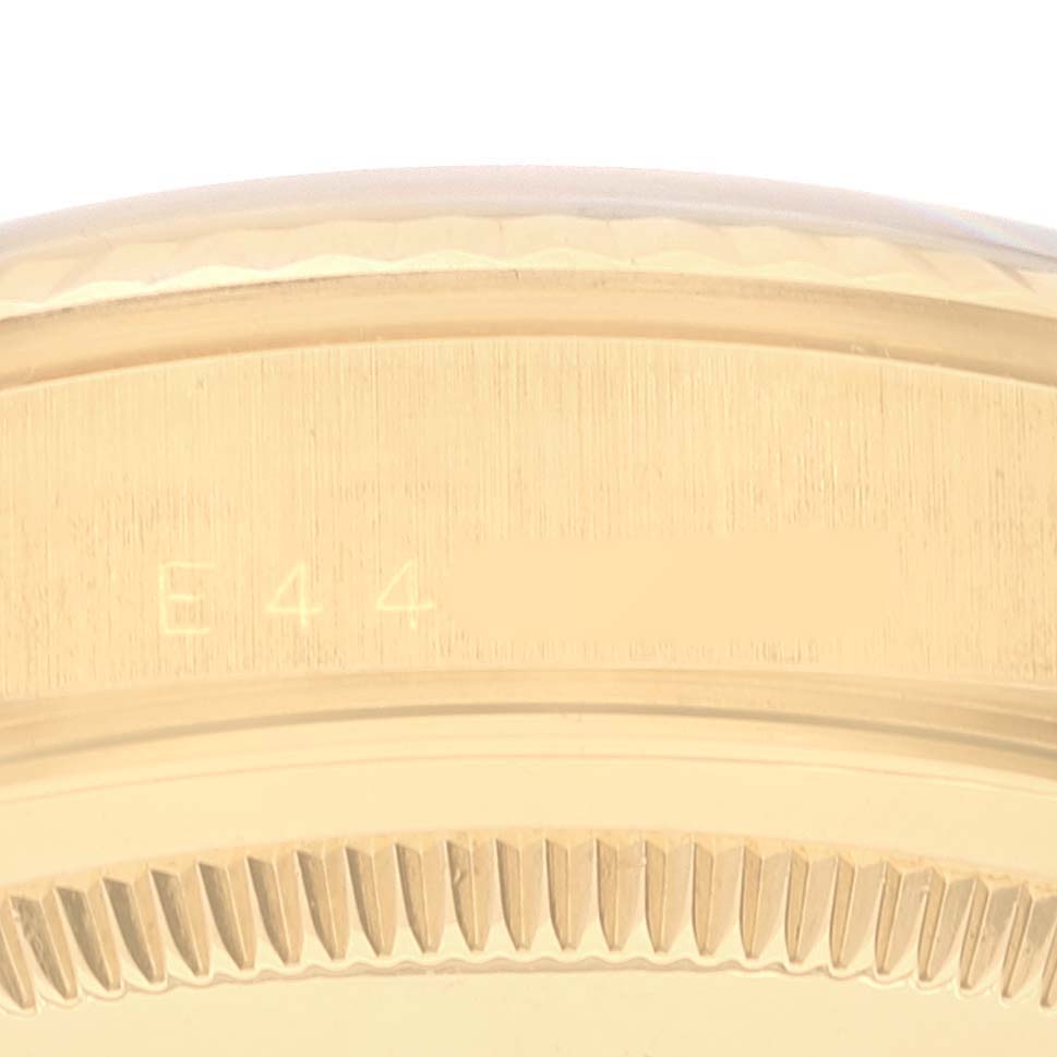 The image shows a close-up of the side view of the bezel and edge of the case for the Rolex President 18238 Men's Yellow Gold Champagne Dial 18238 Men's Yellow Gold Champagne Dial model watch.