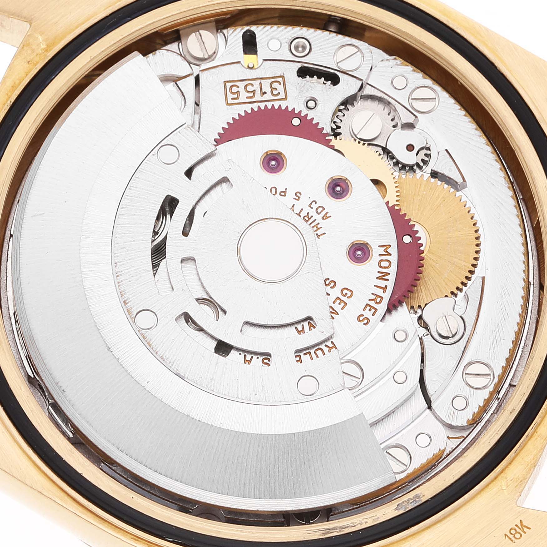 This image shows a close-up view of the intricate internal mechanism of a Rolex President 18238 Men's Yellow Gold Champagne Dial 18238 Men's Yellow Gold Champagne Dial model watch.