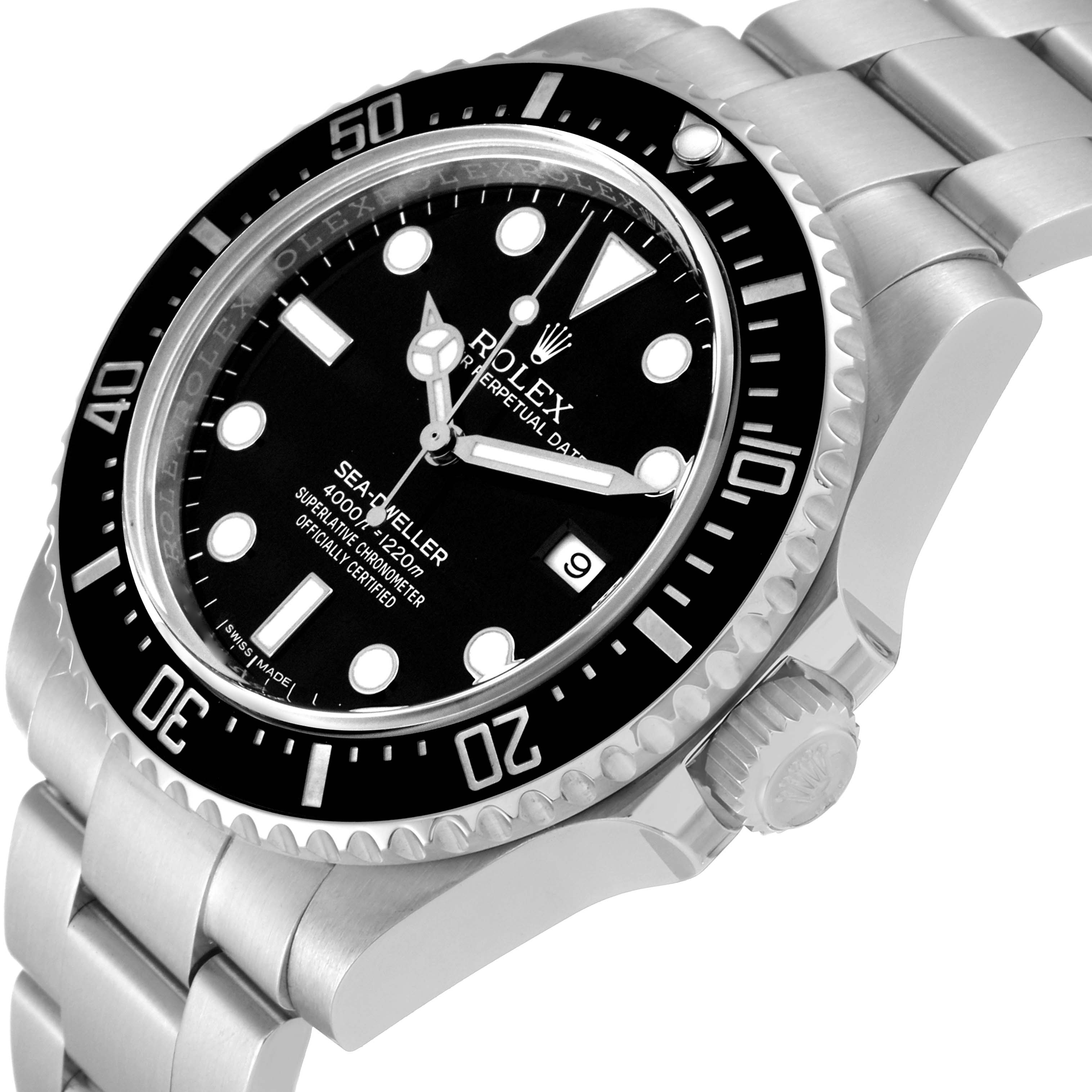 The image shows a Rolex Sea-Dweller 116600 Men
s Stainless Steel Black Dial 116600 Men
s Stainless Steel Black Dial watch at an angled close-up, highlighting its black dial, bezel, and bracelet.