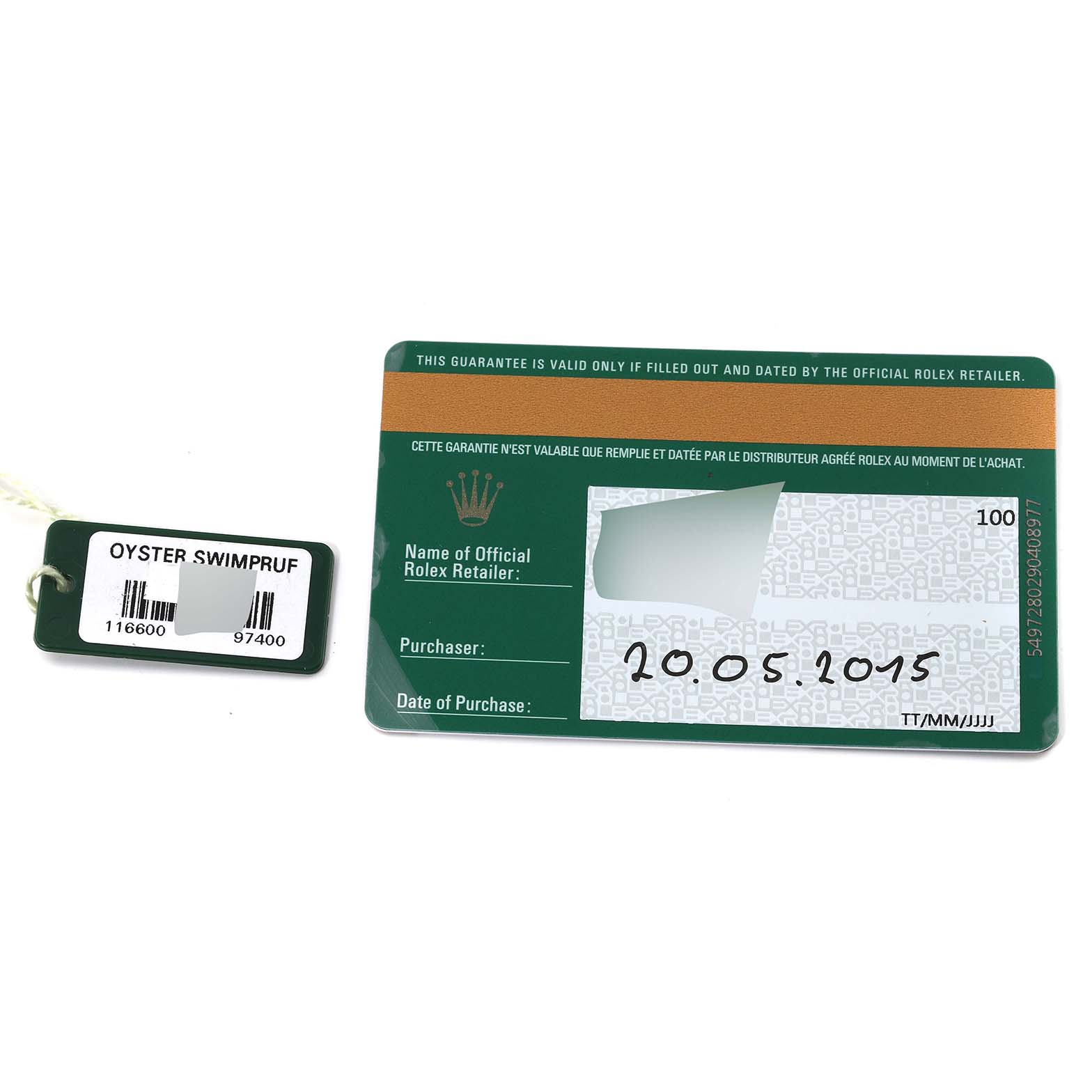 The image shows a warranty card and an Oyster Swimpruf tag for the Rolex Sea-Dweller 116600 Men
s Stainless Steel Black Dial 116600 Men
s Stainless Steel Black Dial model.