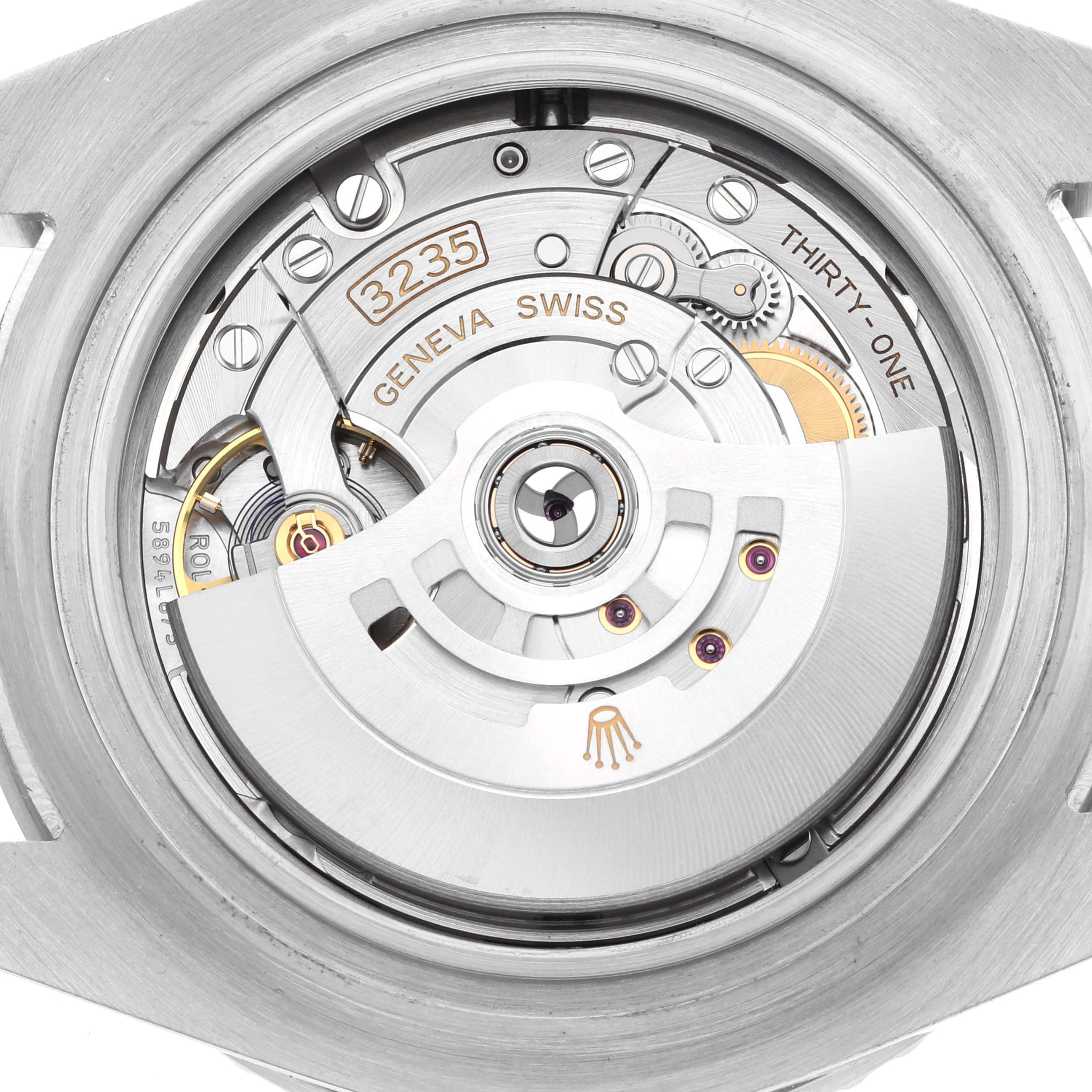 This image shows the back view of a Rolex Sea-Dweller 126600 Men's Stainless Steel Black Dial watch, highlighting the intricate movement and rotor mechanisms.