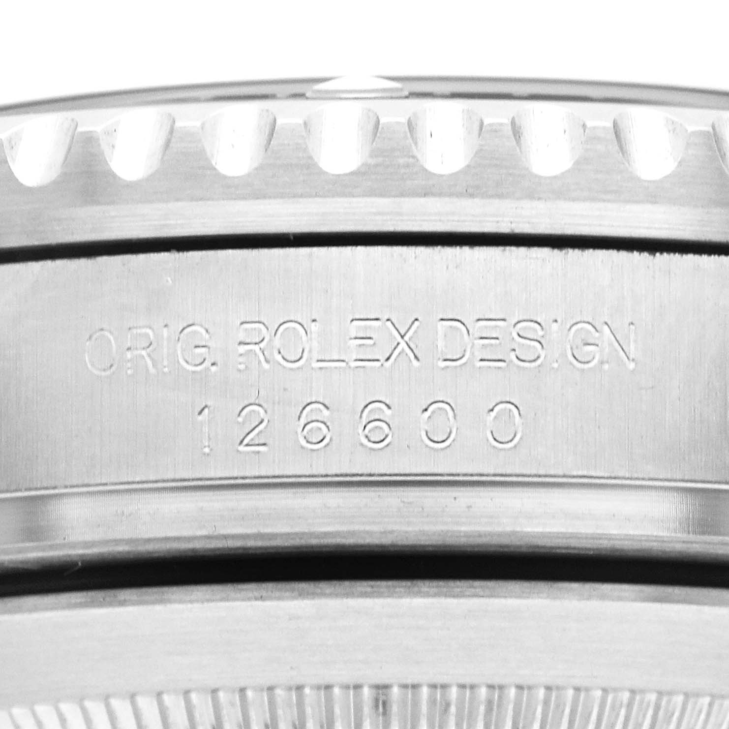 The image shows a close-up of the side of the Rolex Sea-Dweller 126600 Men's Stainless Steel Black Dial, highlighting the model number 126600 and engraving details.