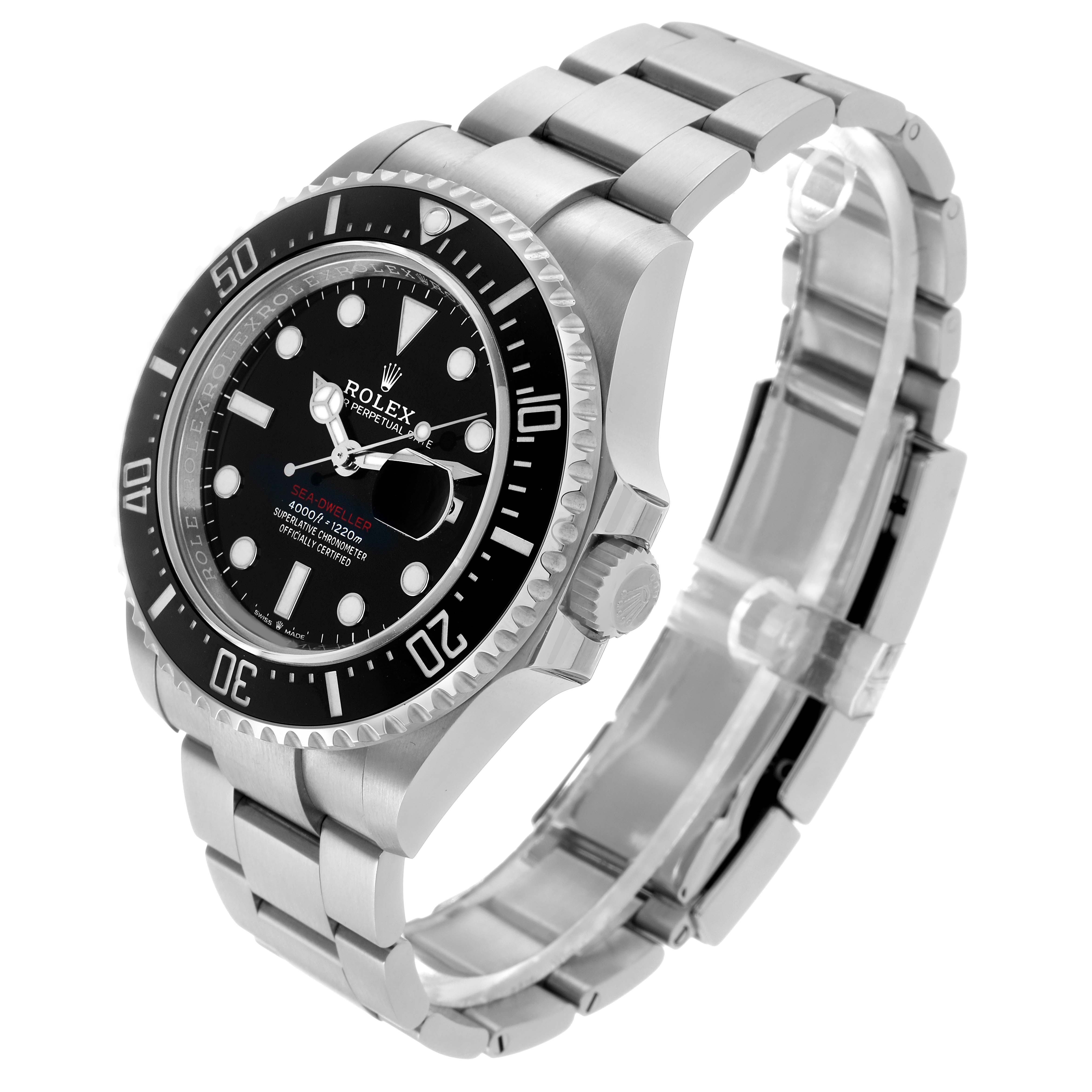 The Rolex Sea-Dweller 126600 Men's Stainless Steel Black Dial is shown at an angled top-down view, highlighting the bezel, dial, crown, and bracelet.