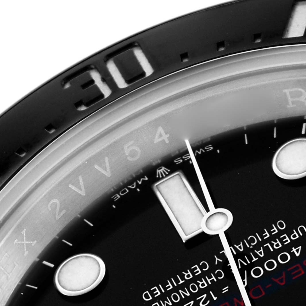 The close-up image shows the upper-left side of the Rolex Sea-Dweller 126600 Men's Stainless Steel Black Dial's dial and bezel, displaying hour markers and the number "30."