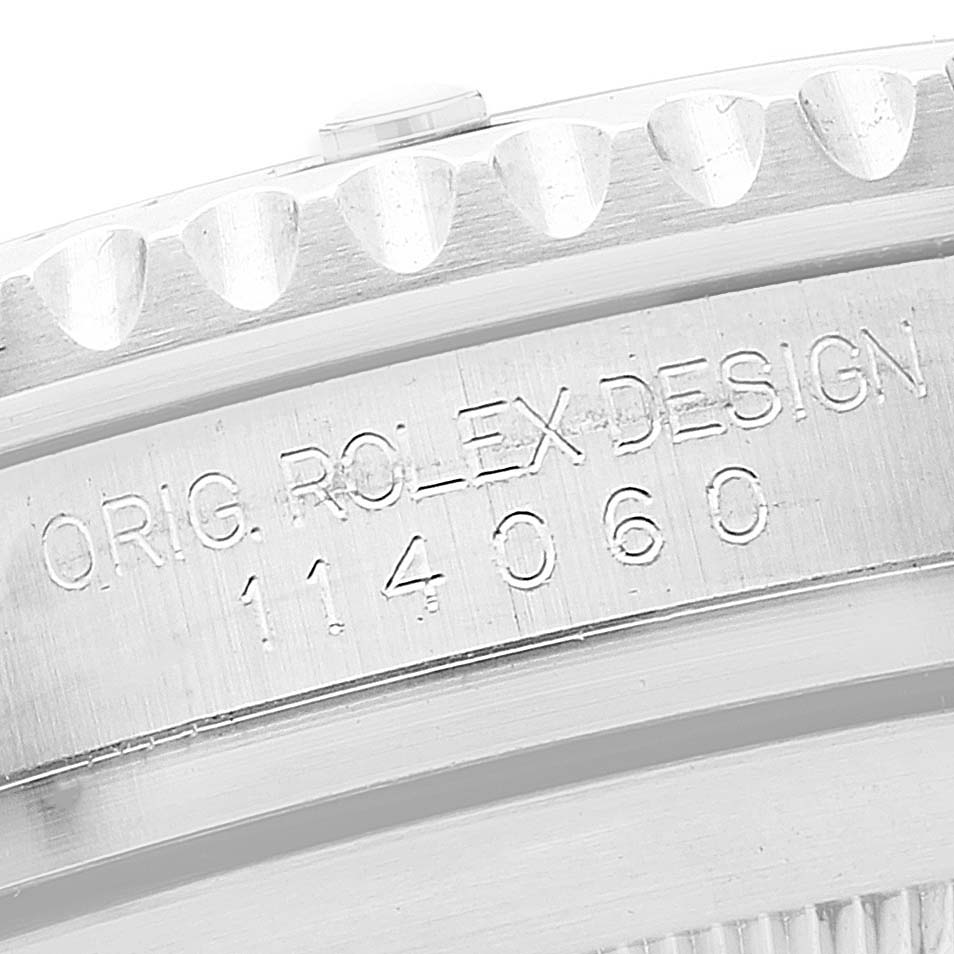 This close-up image shows the serial number engraving on the side of the bezel of a Rolex Submariner 114060 Men
s Stainless Steel Black Dial 114060 Men
s Stainless Steel Black Dial watch.