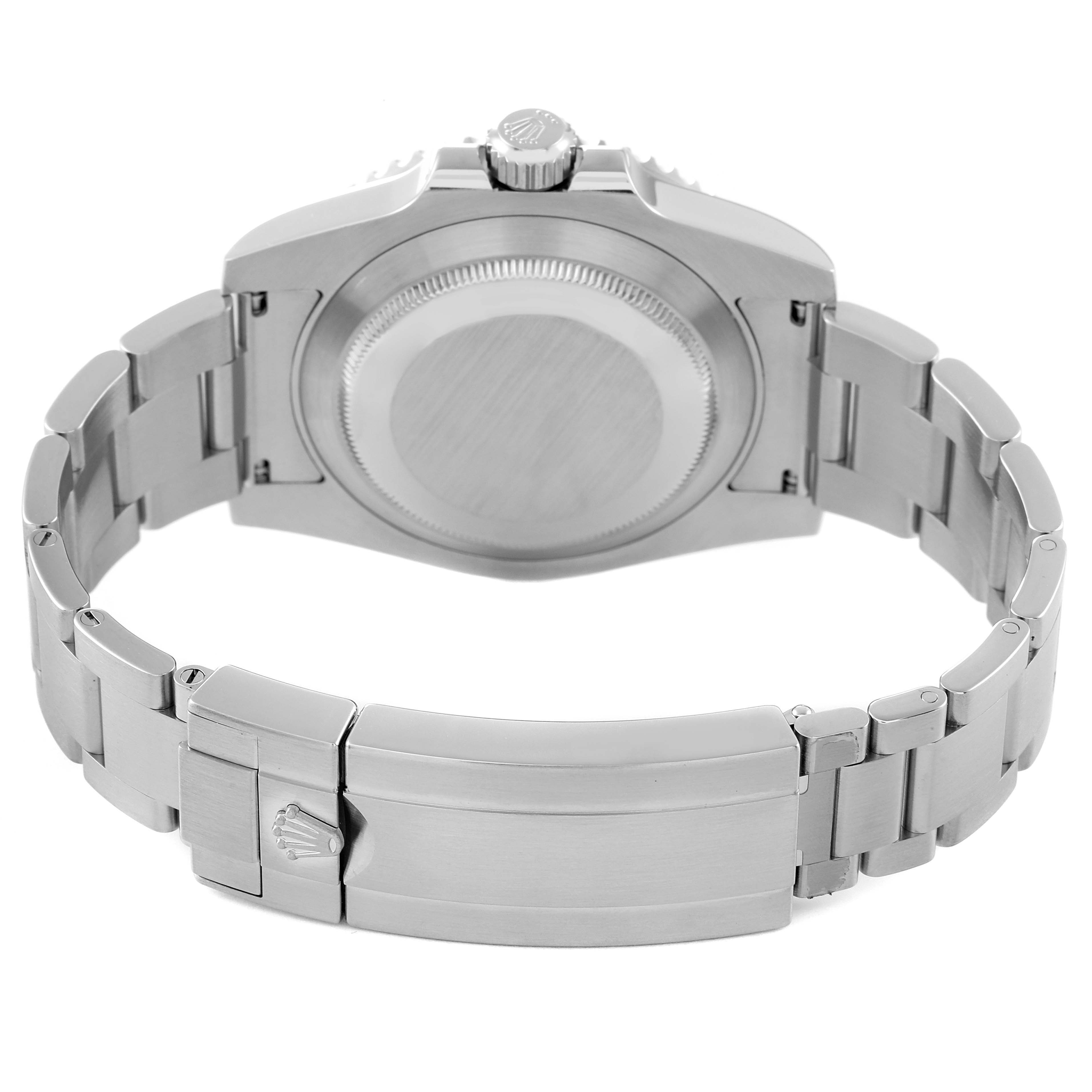 The image shows the rear side of a Rolex Submariner 114060 Men
s Stainless Steel Black Dial 114060 Men
s Stainless Steel Black Dial, highlighting the case back, crown, and bracelet clasp.