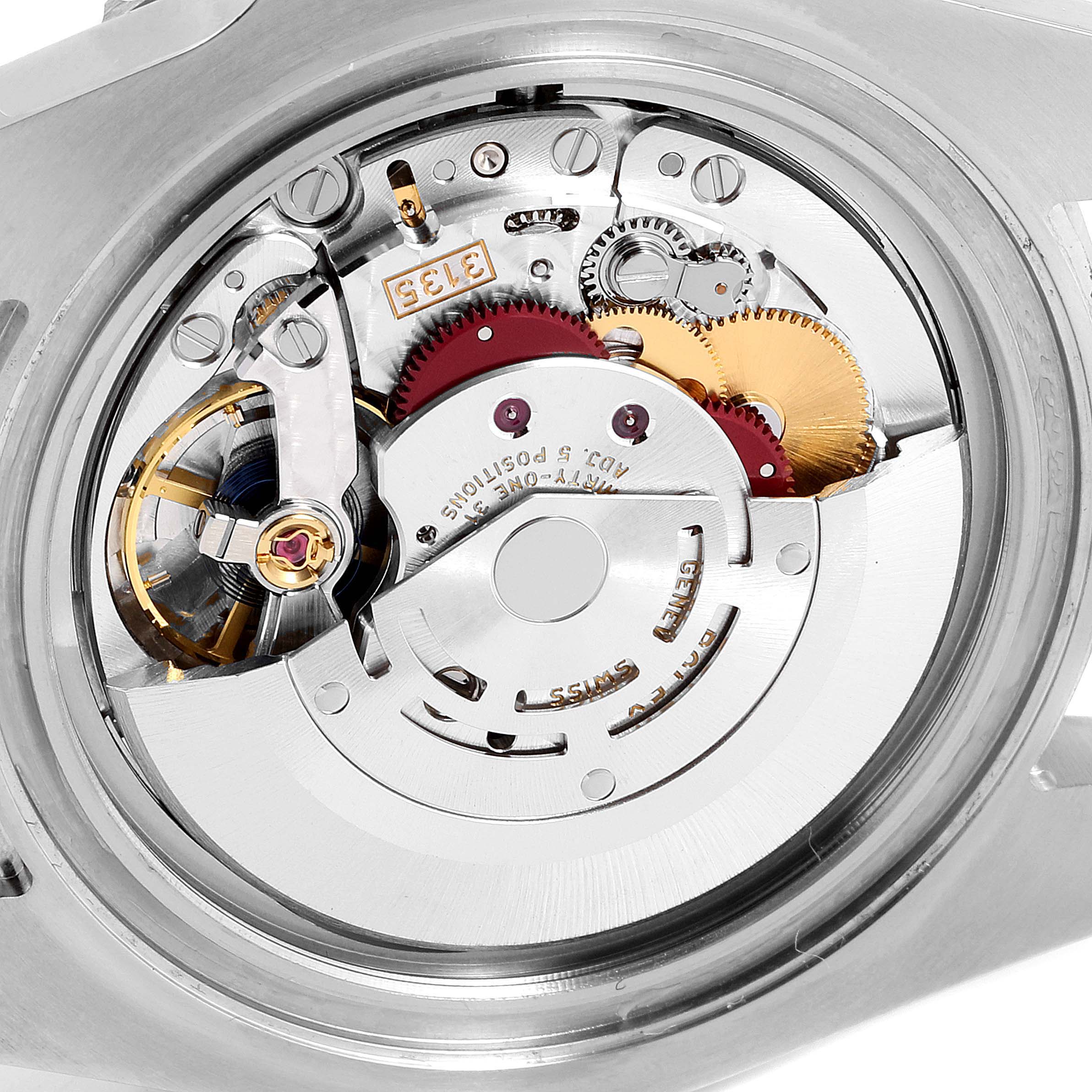 This image shows a close-up view of the movement mechanism inside a Rolex Submariner 116610 Men's Stainless Steel Black Dial 116610 Men's Stainless Steel Black Dial watch.