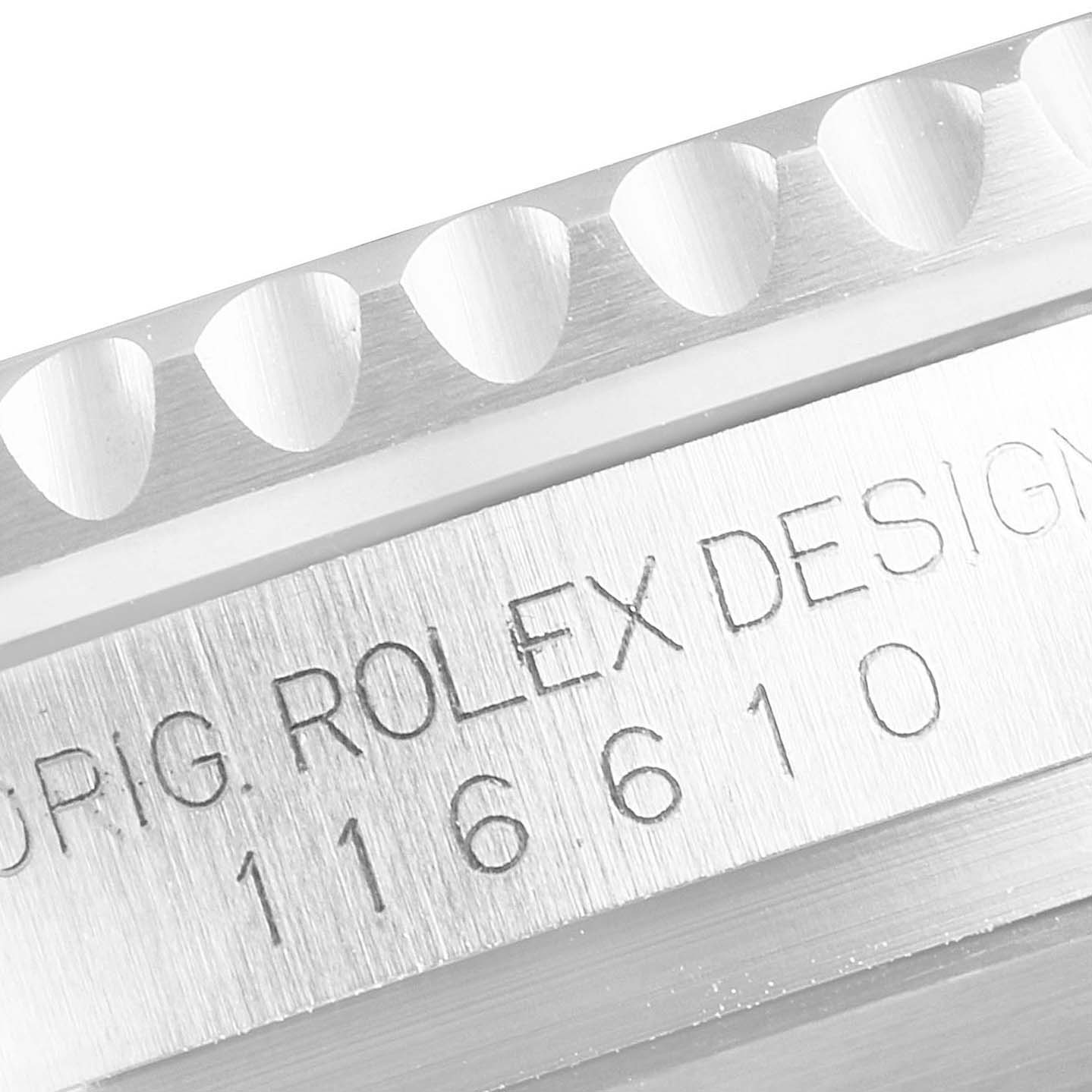 The image shows a close-up of the bezel and engraved side of a Rolex Submariner 116610 Men's Stainless Steel Black Dial 116610 Men's Stainless Steel Black Dial watch.