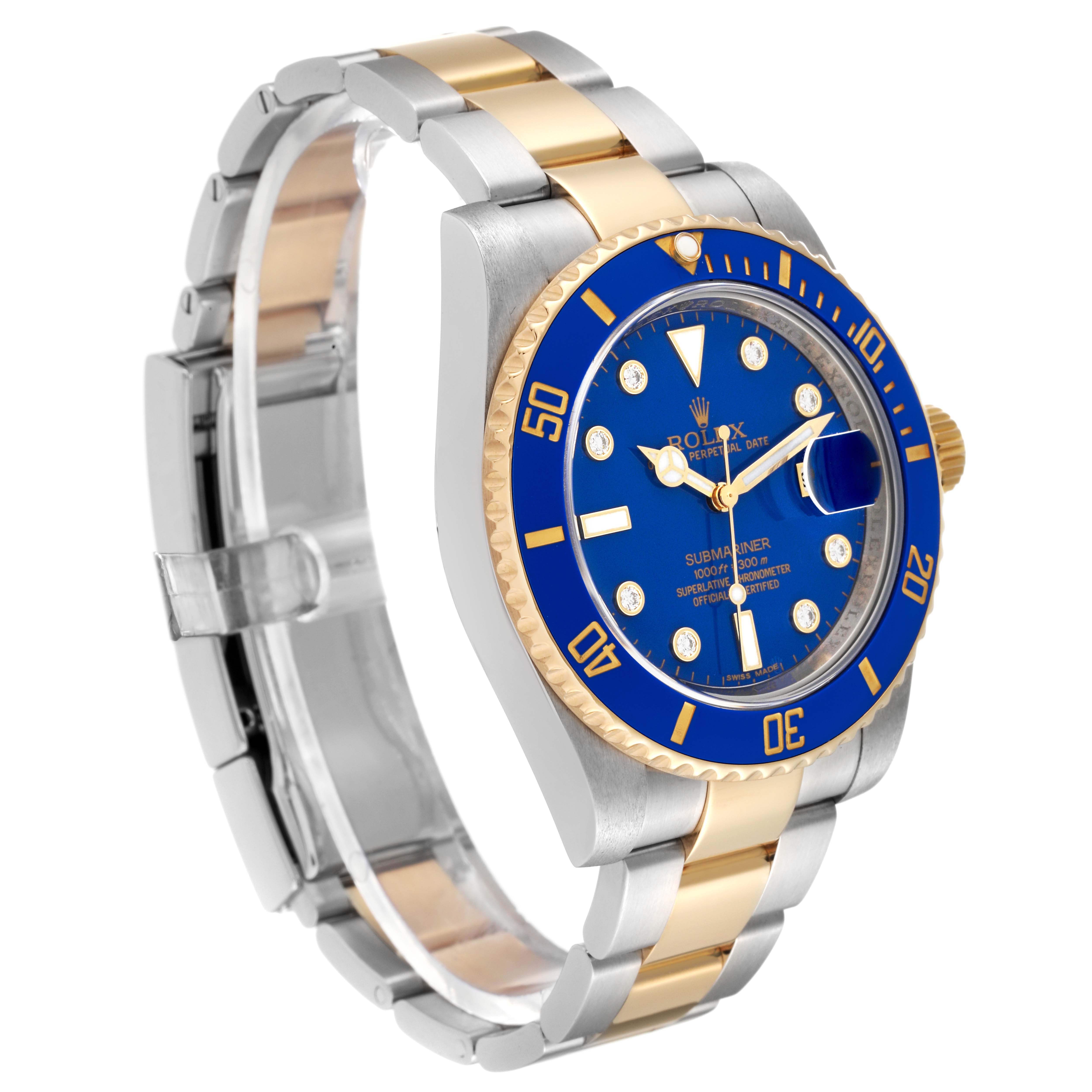 The image shows a Rolex Submariner 116613 Men's Steel and Gold (two tone) Blue Dial 116613 Men's Steel and Gold (two tone) Blue Dial watch at an angled side view, displaying its blue dial, bezel, and two-tone metal bracelet.
