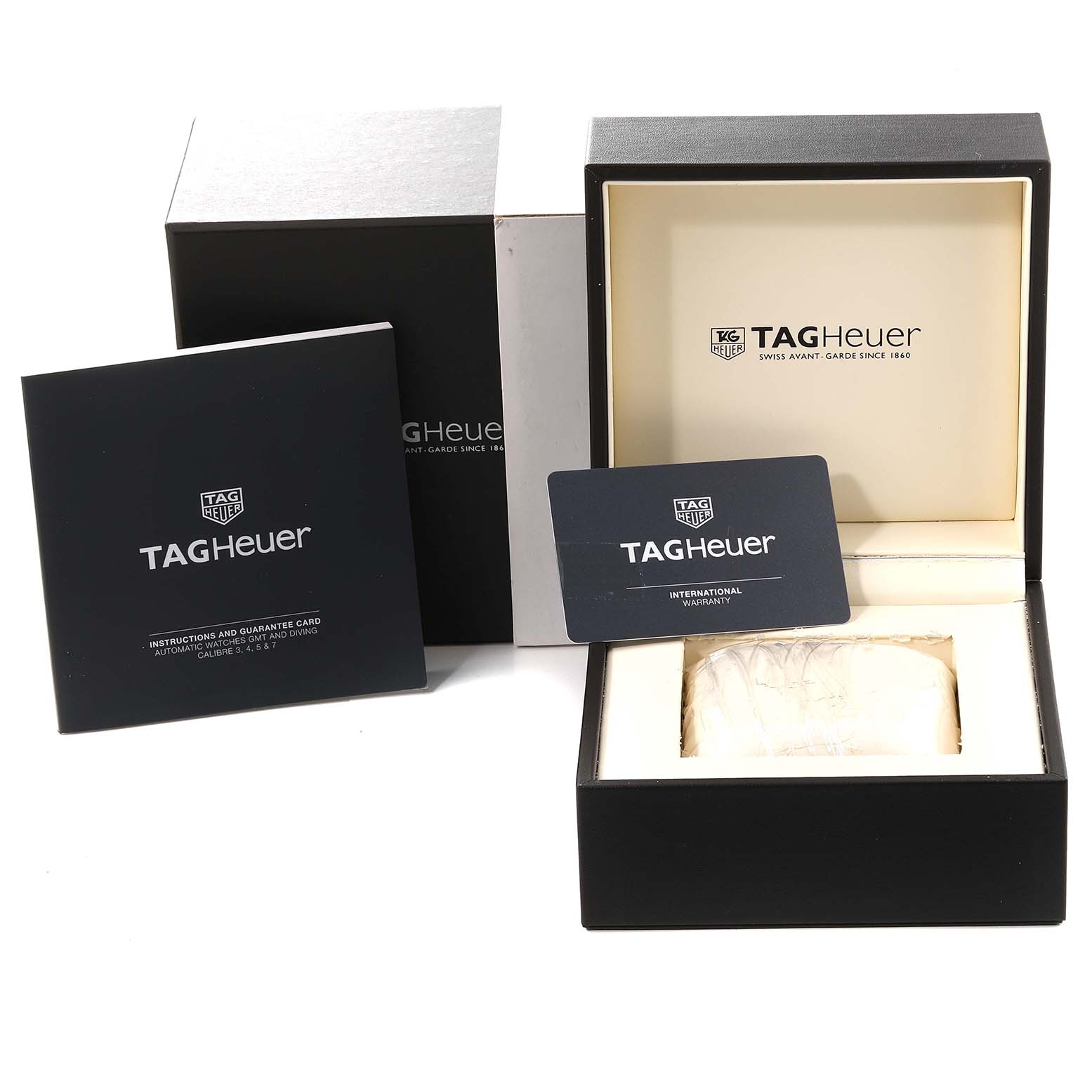 The image shows the box, warranty card, and instruction manual for the Tag Heuer Aquaracer WAY211C.BA0928 Men's Stainless Steel Blue Dial WAY211C.BA0928 Men's Stainless Steel Blue Dial watch, with the box open and empty.