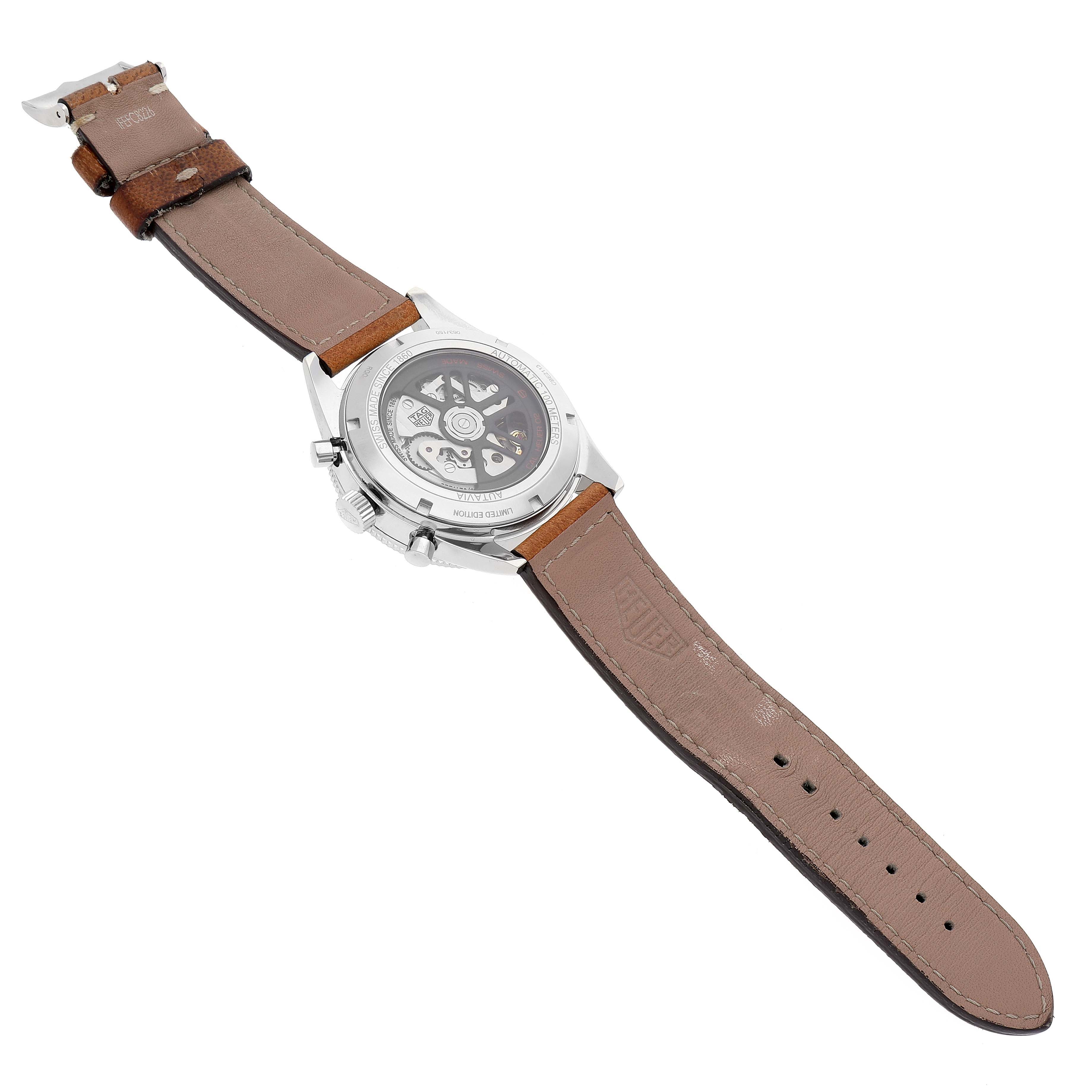 The image shows the back view of a Tag Heuer Limited Edition CBE2113.FC8226 Men
s Stainless Steel Beige Dial CBE2113.FC8226 Men
s Stainless Steel Beige Dial model watch with its leather strap and exposed mechanism.