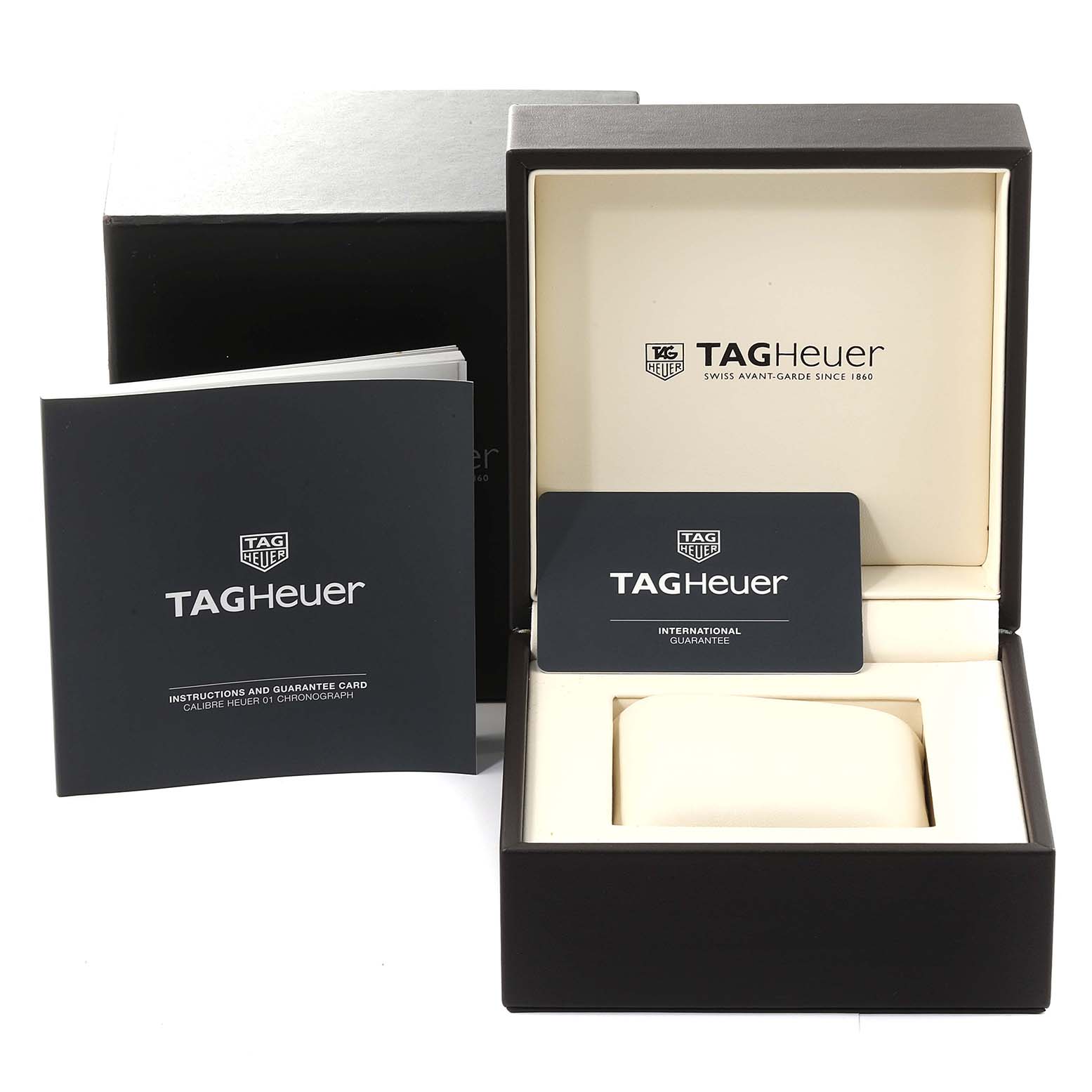 The image shows the box, international guarantee card, and instruction manual for a Tag Heuer Carrera CAR201V.BA0714 Men's Stainless Steel Black Dial CAR201V.BA0714 Men's Stainless Steel Black Dial watch.