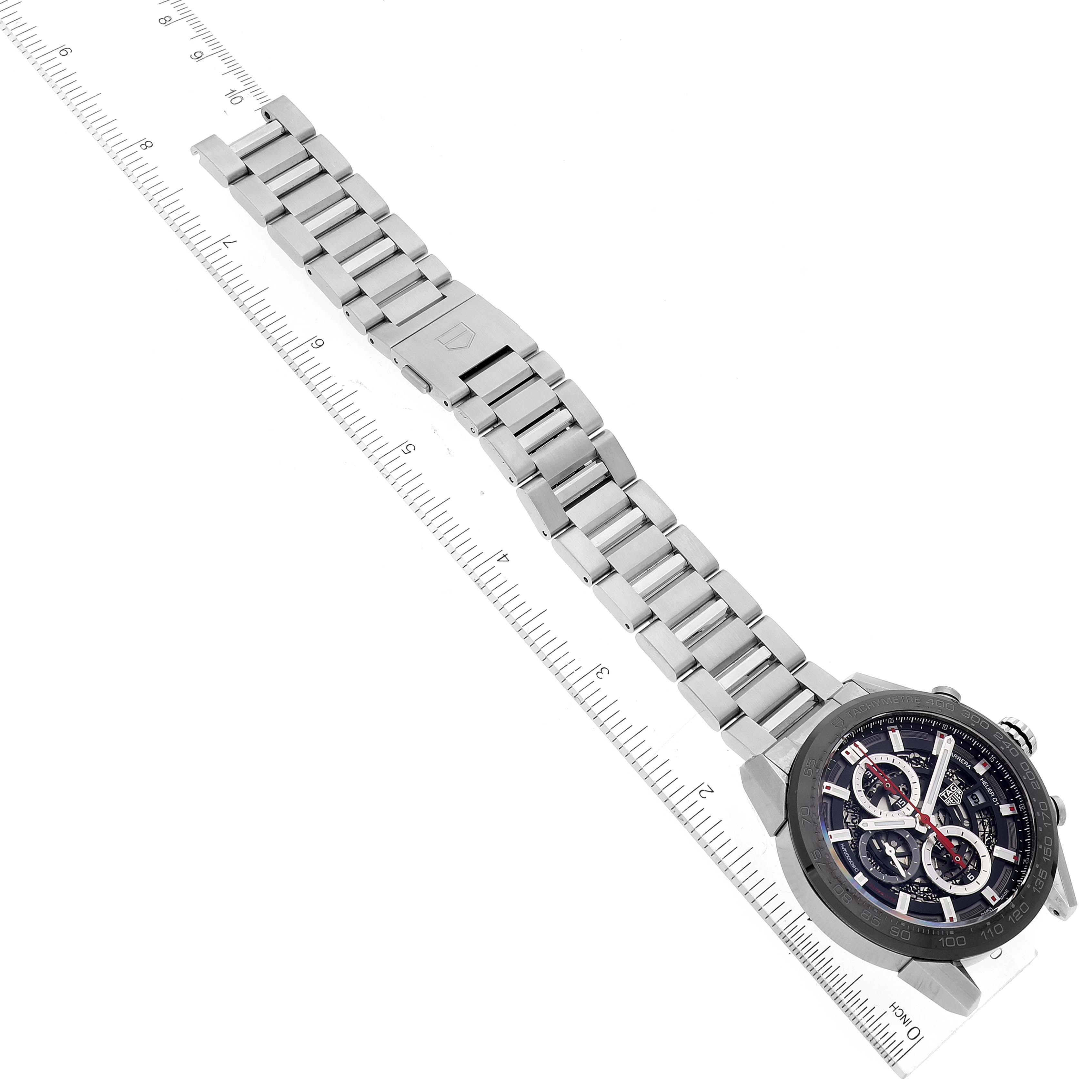 The image shows the Tag Heuer Carrera CAR201V.BA0714 Men's Stainless Steel Black Dial CAR201V.BA0714 Men's Stainless Steel Black Dial model watch laid flat, with a ruler indicating its size.
