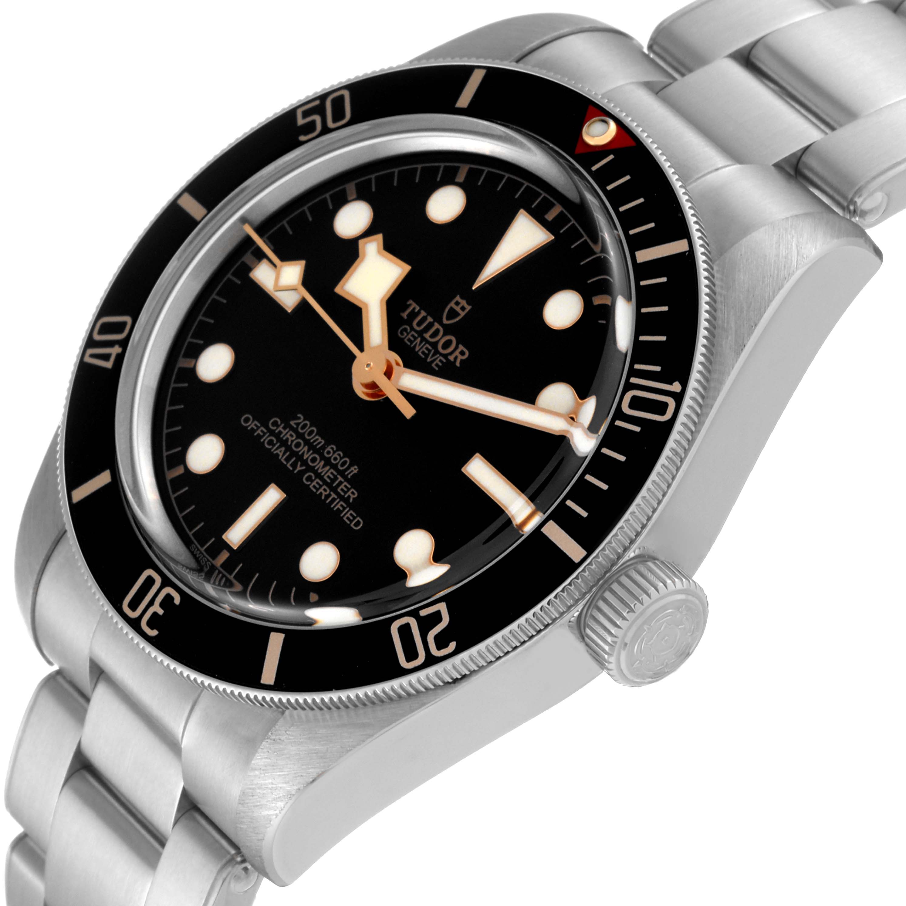 The image shows a tilted close-up of the Tudor Heritage Black Bay M79030N-0001 Men
s Stainless Steel Black Dial M79030N-0001 Men
s Stainless Steel Black Dial watch, highlighting its dial, bezel, crown, and bracelet.