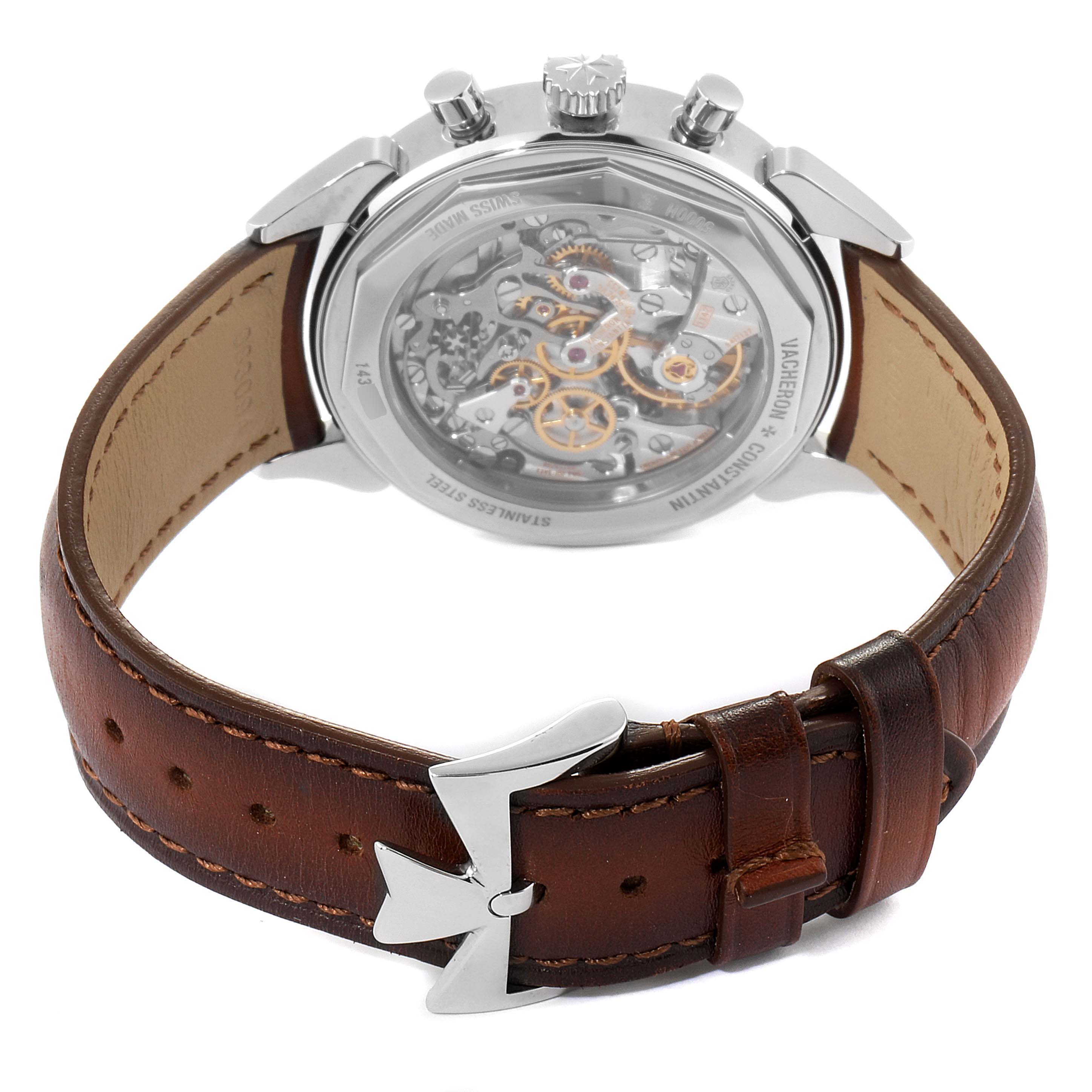 The image shows the backside and movement of the Vintage Vacheron Constantin watch, displaying a leather strap and metal clasp.