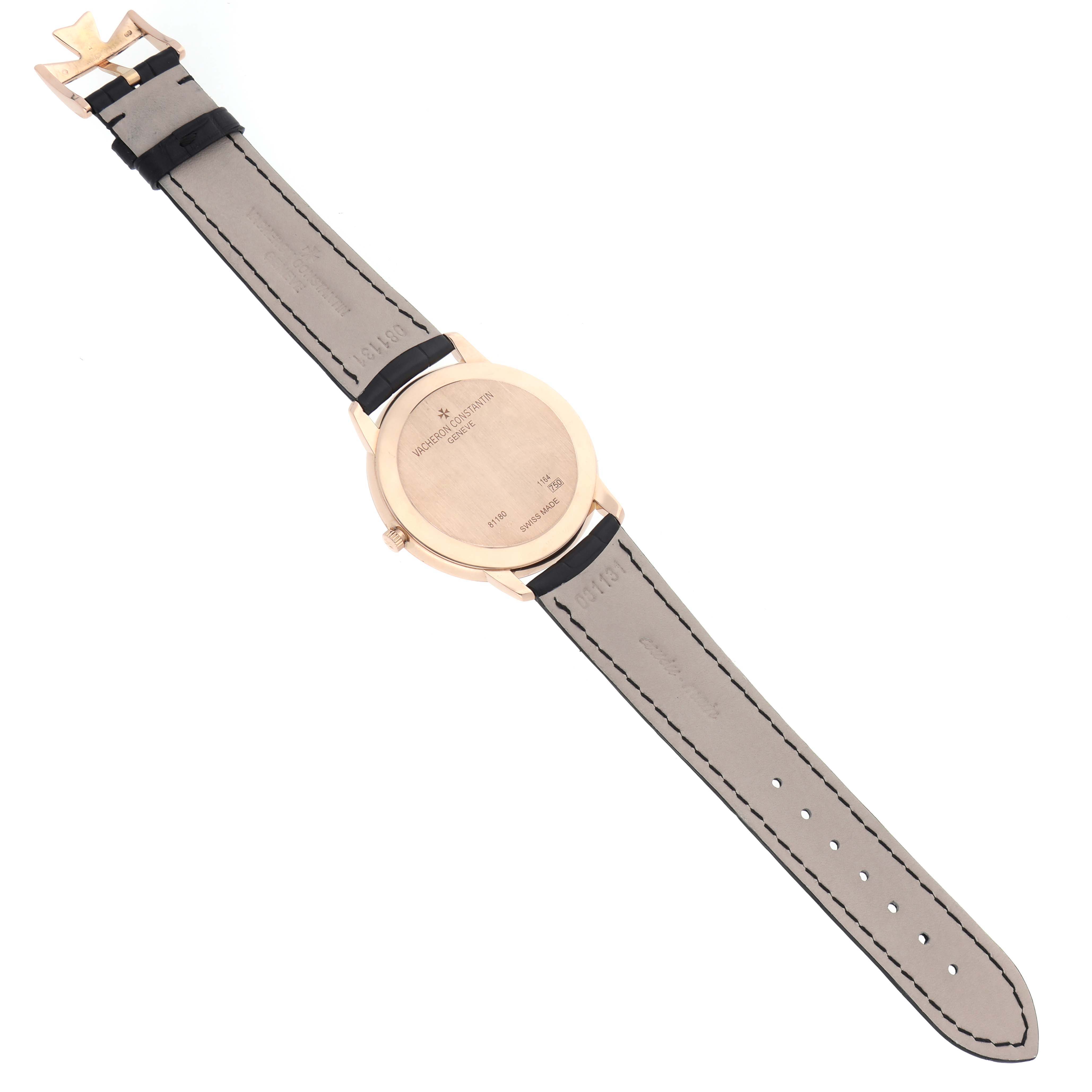The Vacheron Constantin Patrimony 81180 Men's Rose Gold Black Dial 81180 Men's Rose Gold Black Dial watch is shown from the back, displaying its caseback, strap, and clasp.