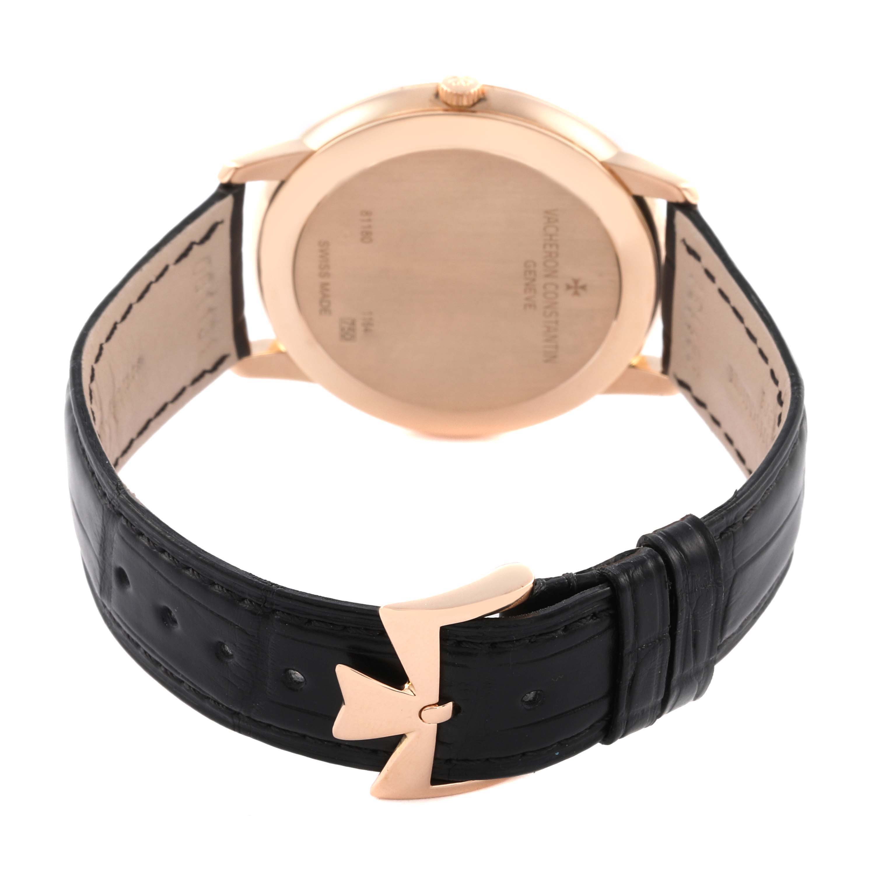 The image shows the reverse side of the Vacheron Constantin Patrimony 81180 Men's Rose Gold Black Dial 81180 Men's Rose Gold Black Dial watch, highlighting the case back and leather strap with a clasp.