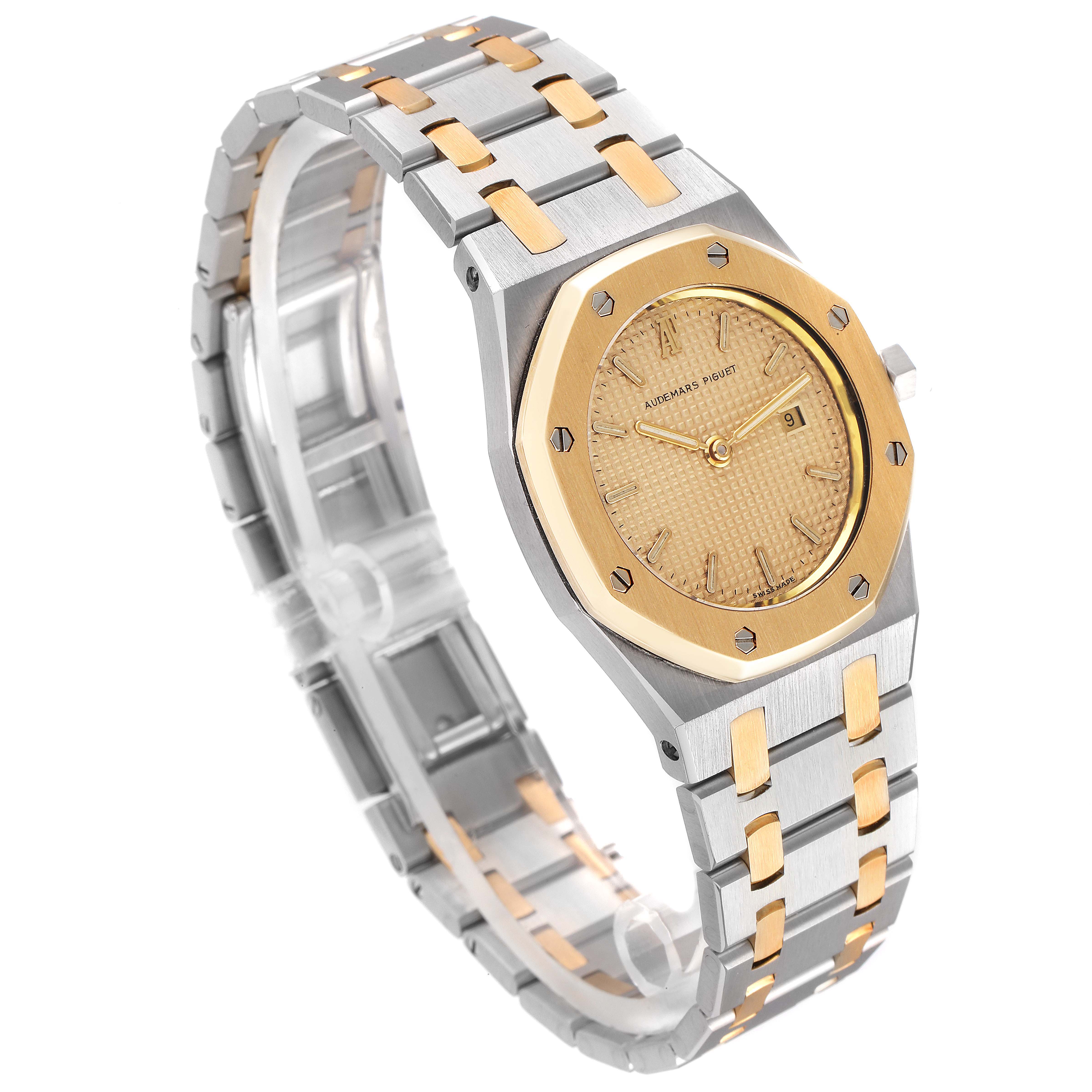 The image shows an angled view of the Audemars Piguet Royal Oak 6271SA/902 Women's Steel and Gold (two tone) Champagne Dial 6271SA/902 Women's Steel and Gold (two tone) Champagne Dial watch, highlighting its two-tone bracelet and octagonal bezel.