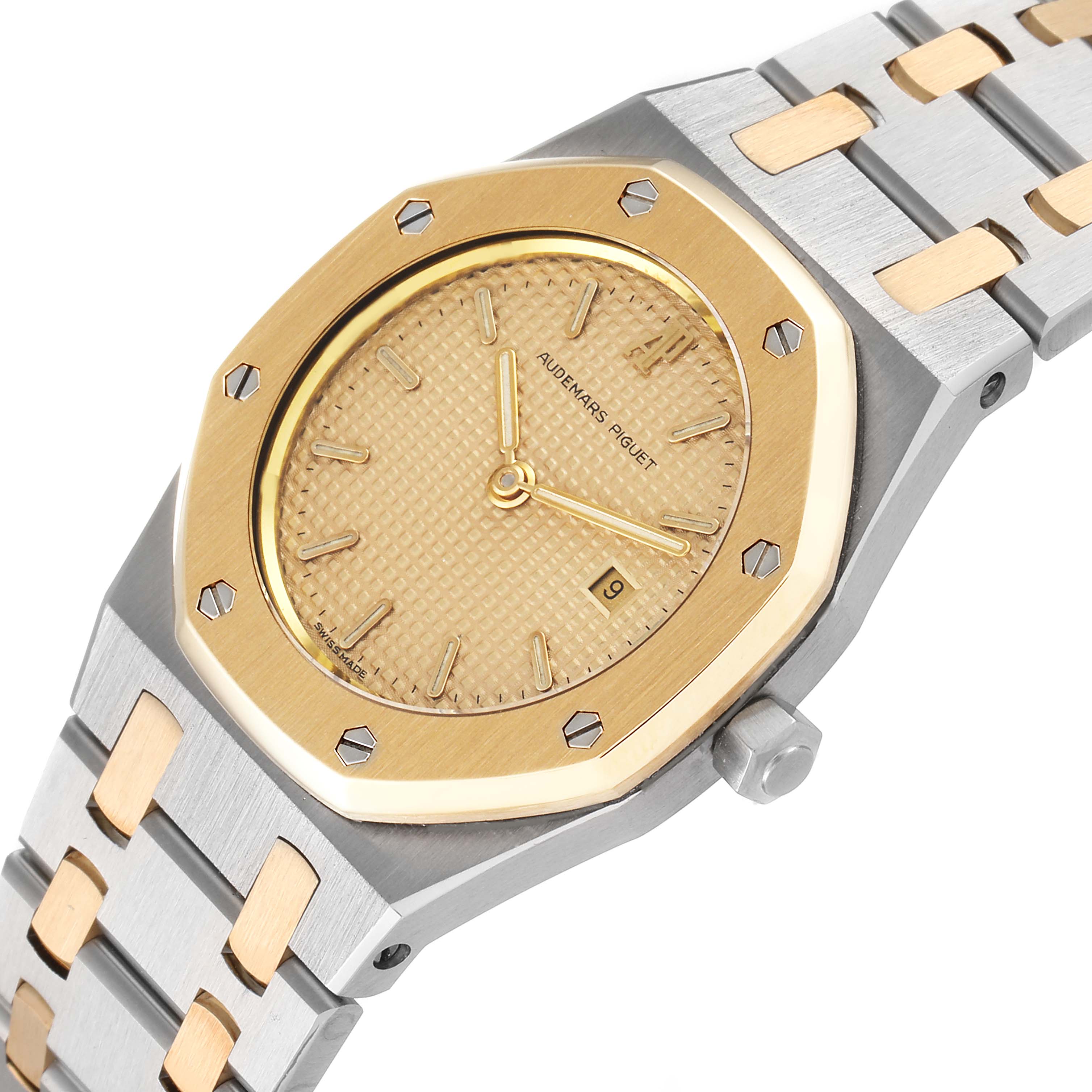 The Royal Oak by Audemars Piguet is shown at a slight angle, revealing its gold-toned dial, octagonal bezel, and two-tone bracelet.