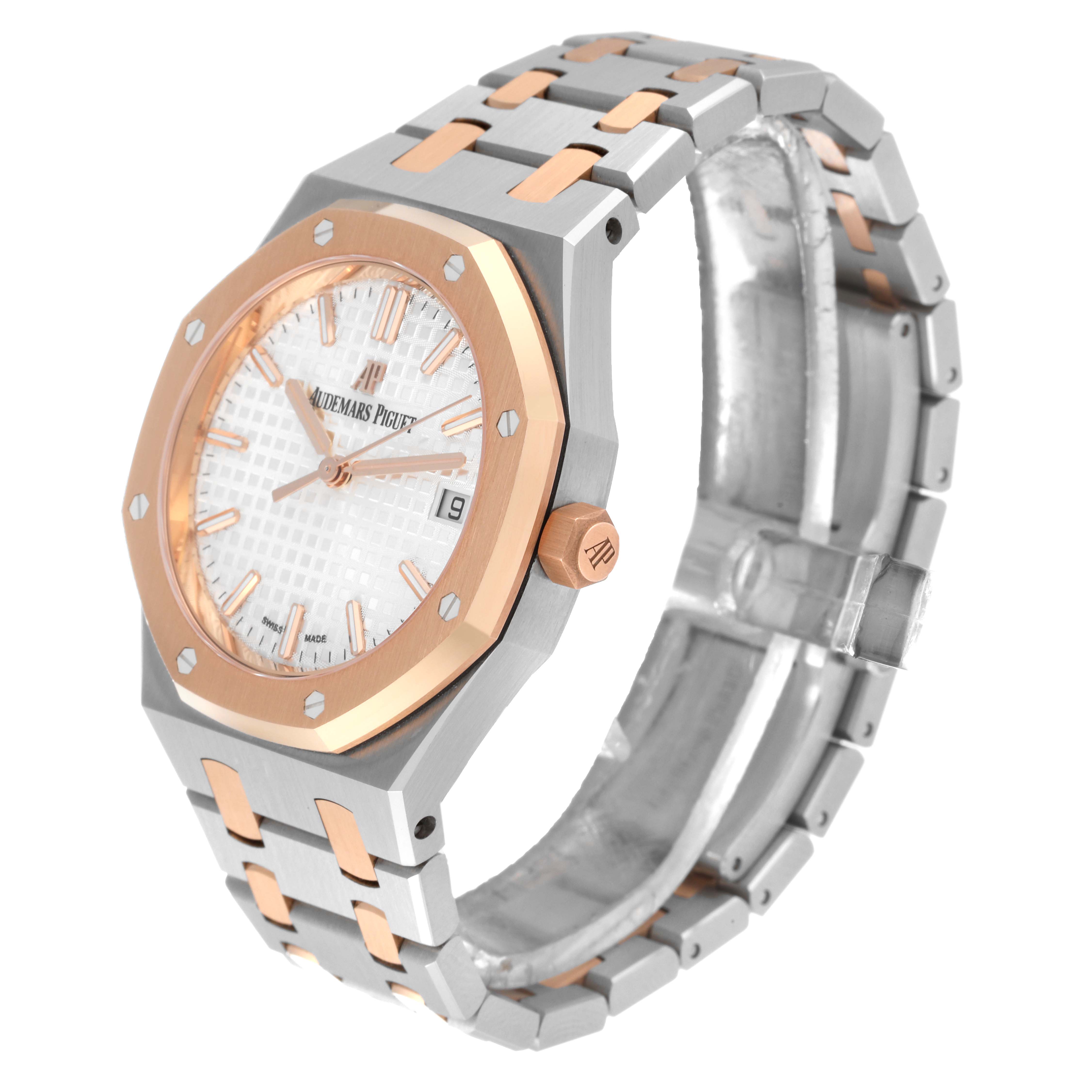 The image shows an angled view of an Audemars Piguet Royal Oak 77350SR.OO.1261SR.01 Men's Steel and Gold (two tone) Silver Dial 77350SR.OO.1261SR.01 Men's Steel and Gold (two tone) Silver Dial watch displaying its face, crown, and bracelet.