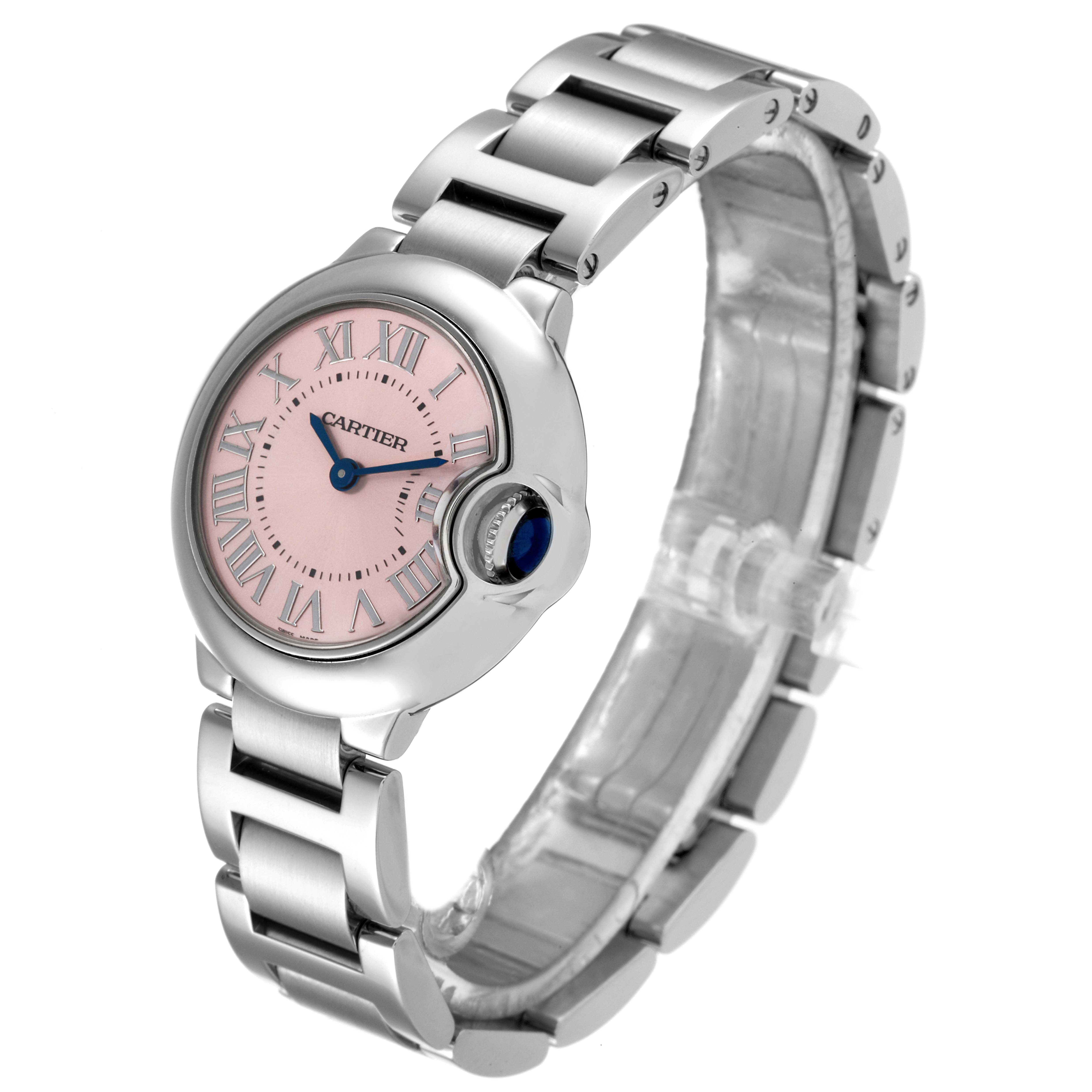 This image shows a Cartier Ballon Bleu W6920038 Women
s Stainless Steel Pink Dial W6920038 Women
s Stainless Steel Pink Dial watch at an angle that highlights its dial, crown, and metal bracelet.