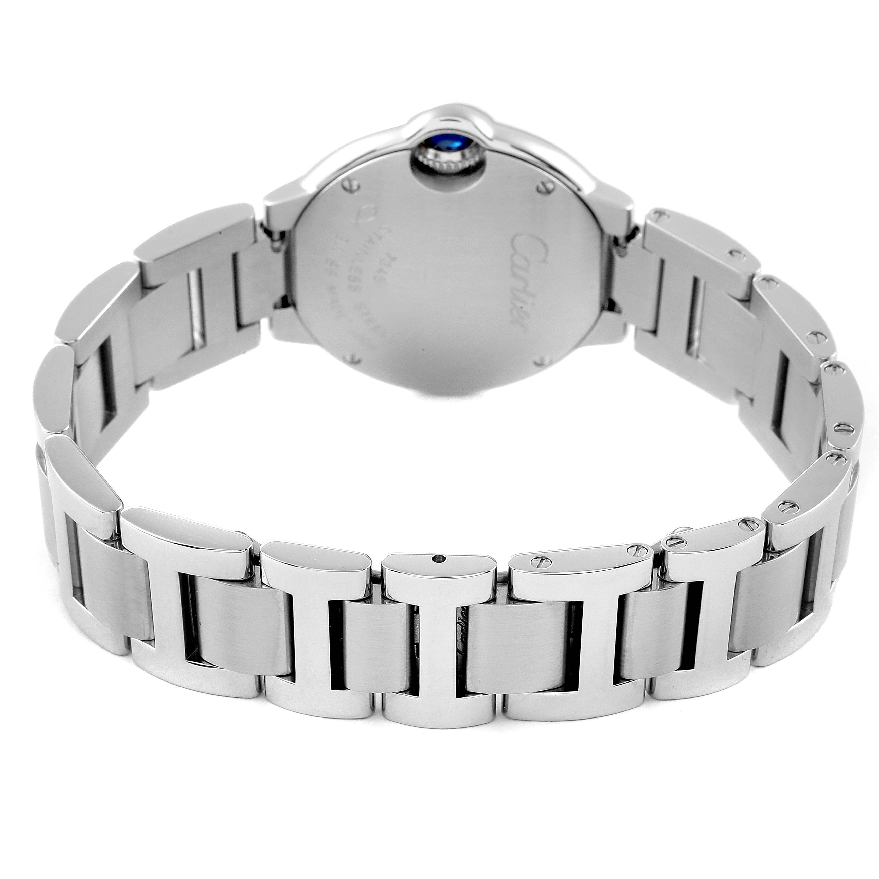 The image shows the back of a Ballon Bleu by Cartier watch, highlighting its bracelet and case back with the crown visible.