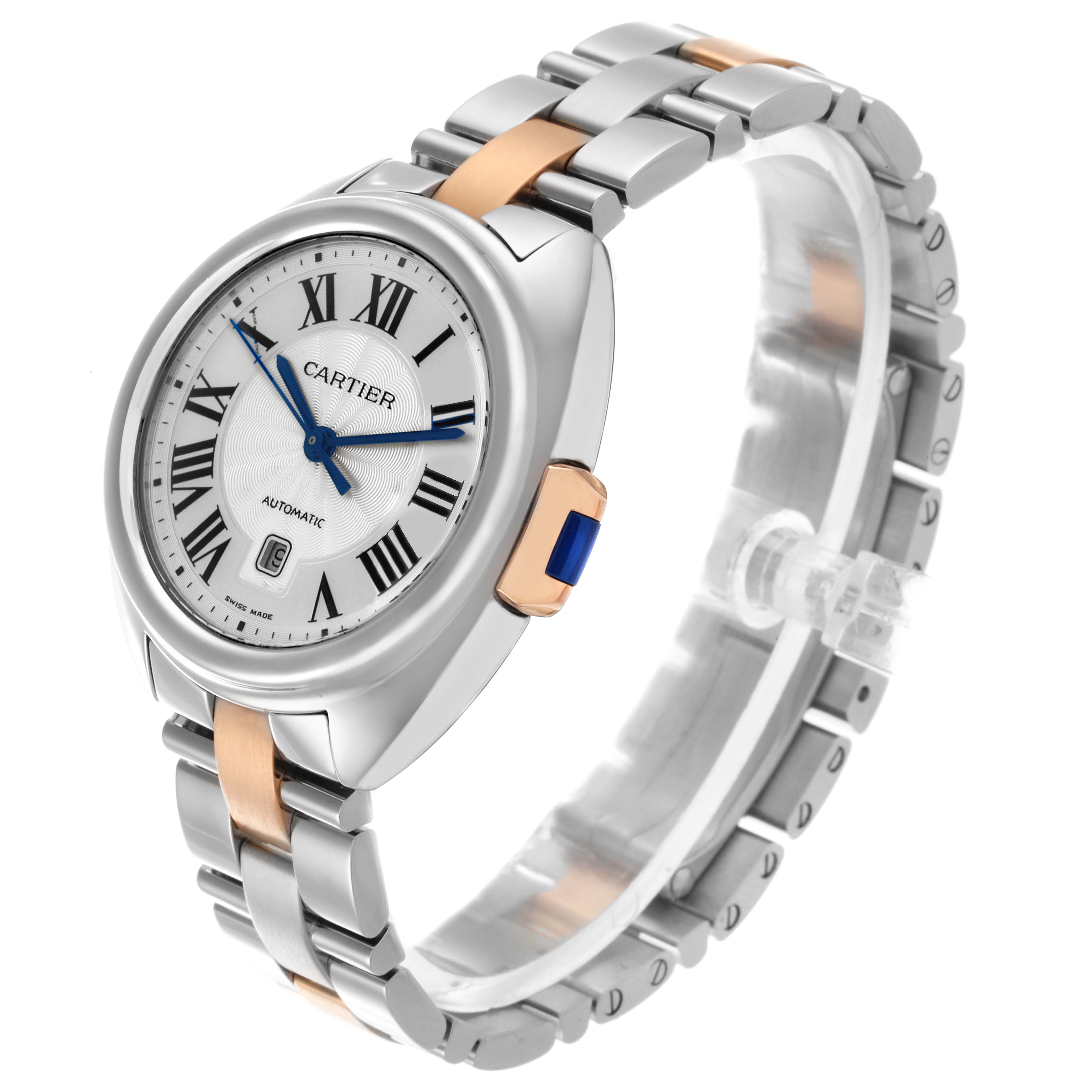 The Cartier Clé watch is shown at a slight angle, highlighting the dial, crown, and two-tone bracelet.