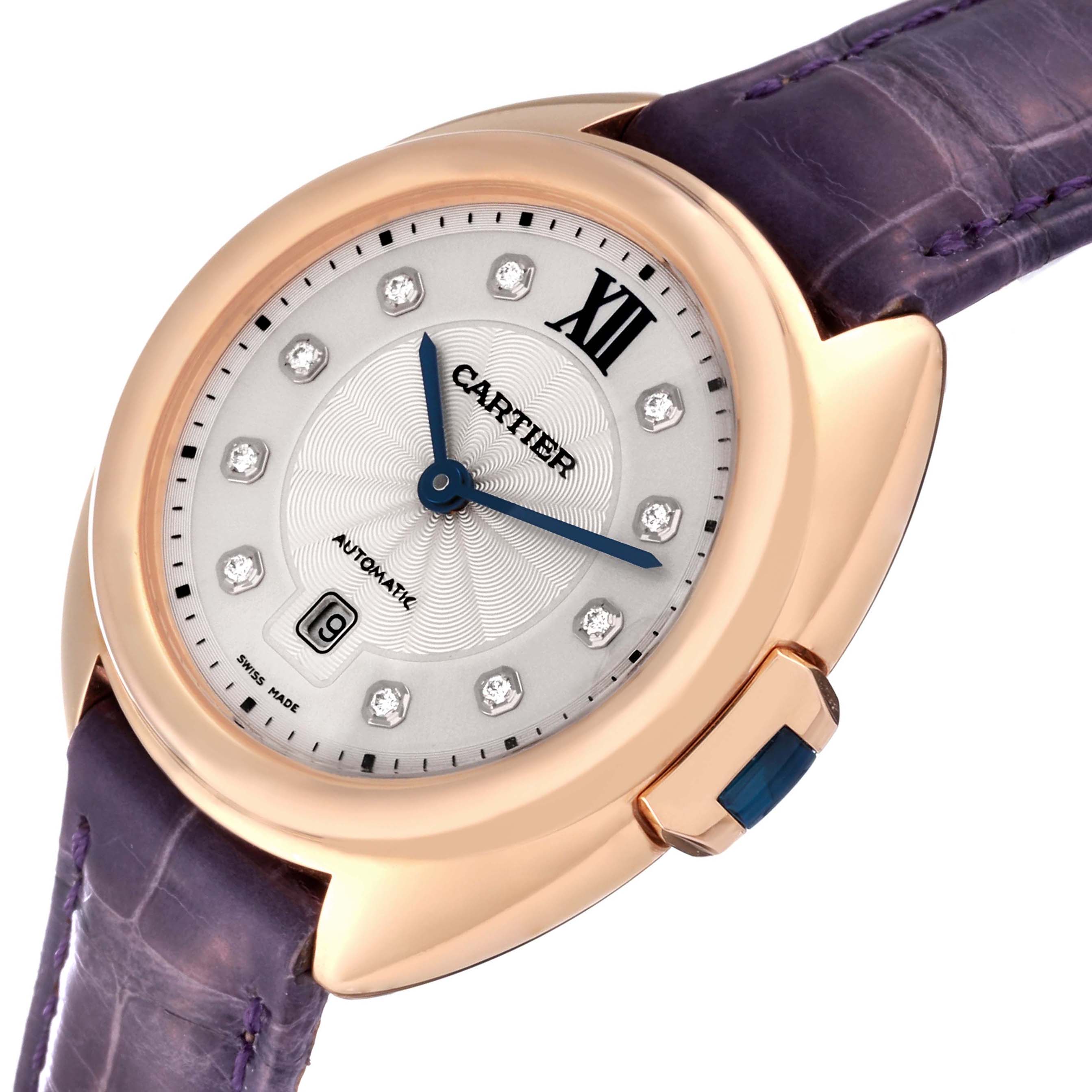 The image shows a Cle de Cartier watch at a slight angle, displaying its face, bezel, dial, and leather strap.