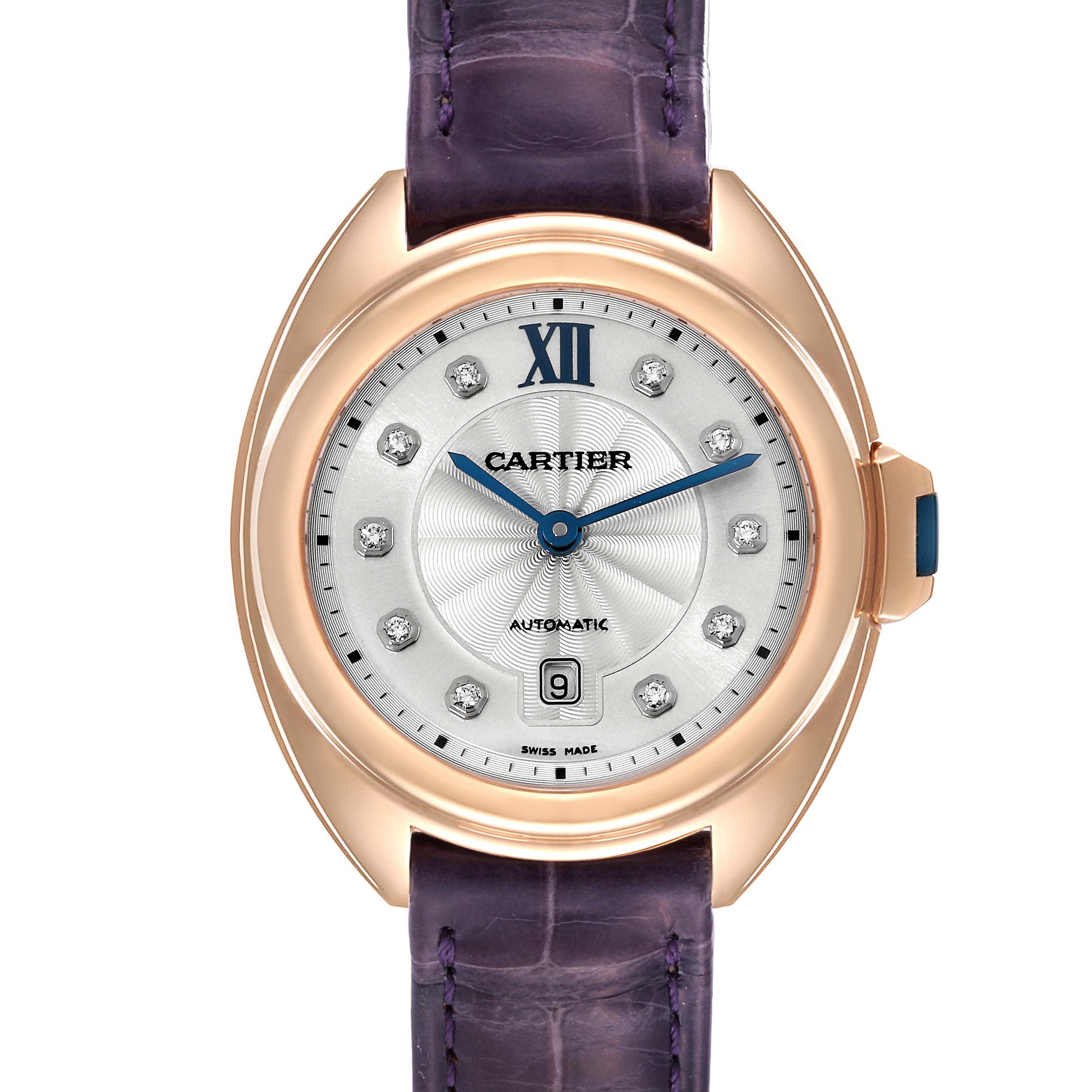 The Cartier Clé watch is shown from a top-down angle, highlighting its dial, case, bezel, and strap.