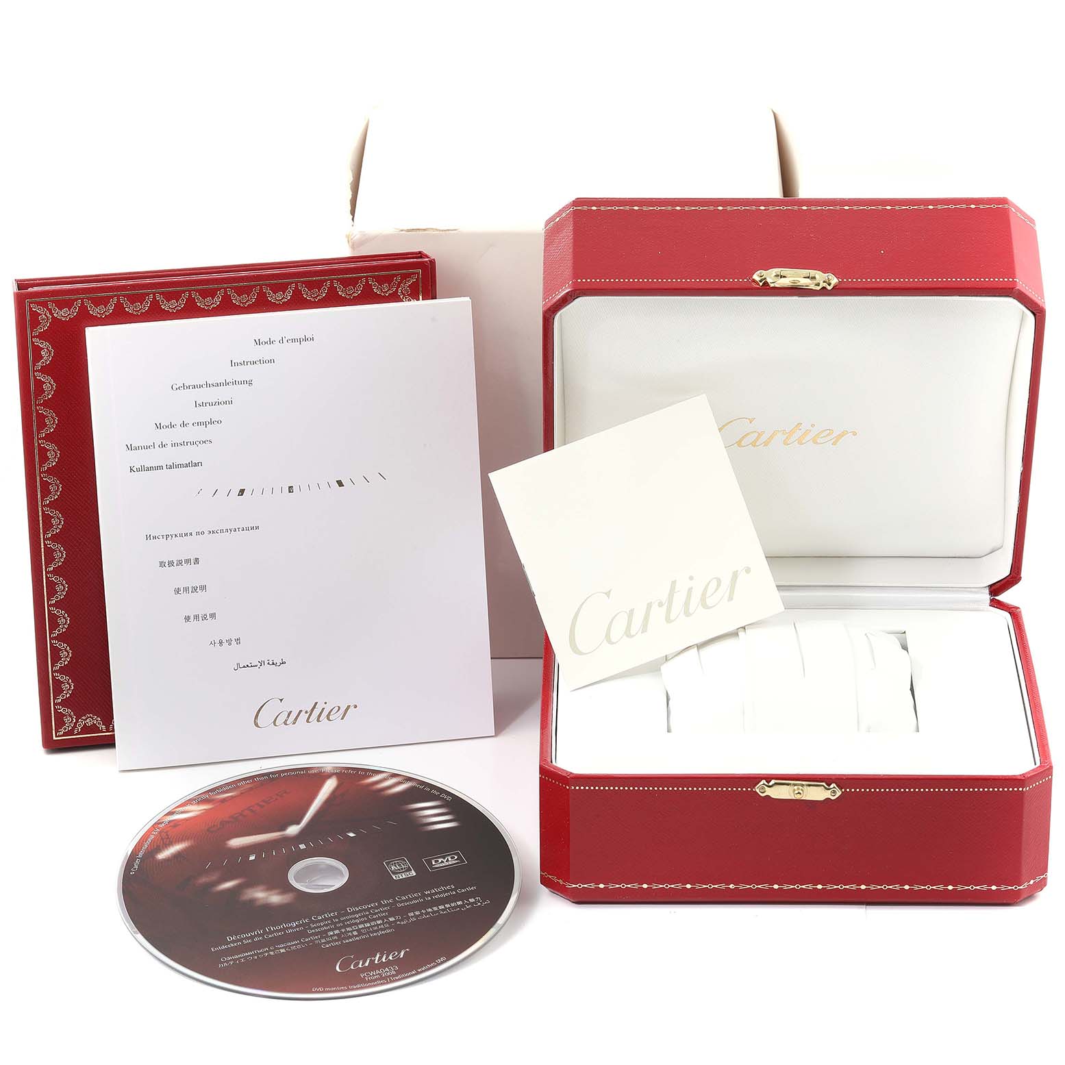 The image shows the packaging, manual, and DVD accessories for the Cartier Pasha W31037H3 Men's Stainless Steel Silver Dial W31037H3 Men's Stainless Steel Silver Dial watch.