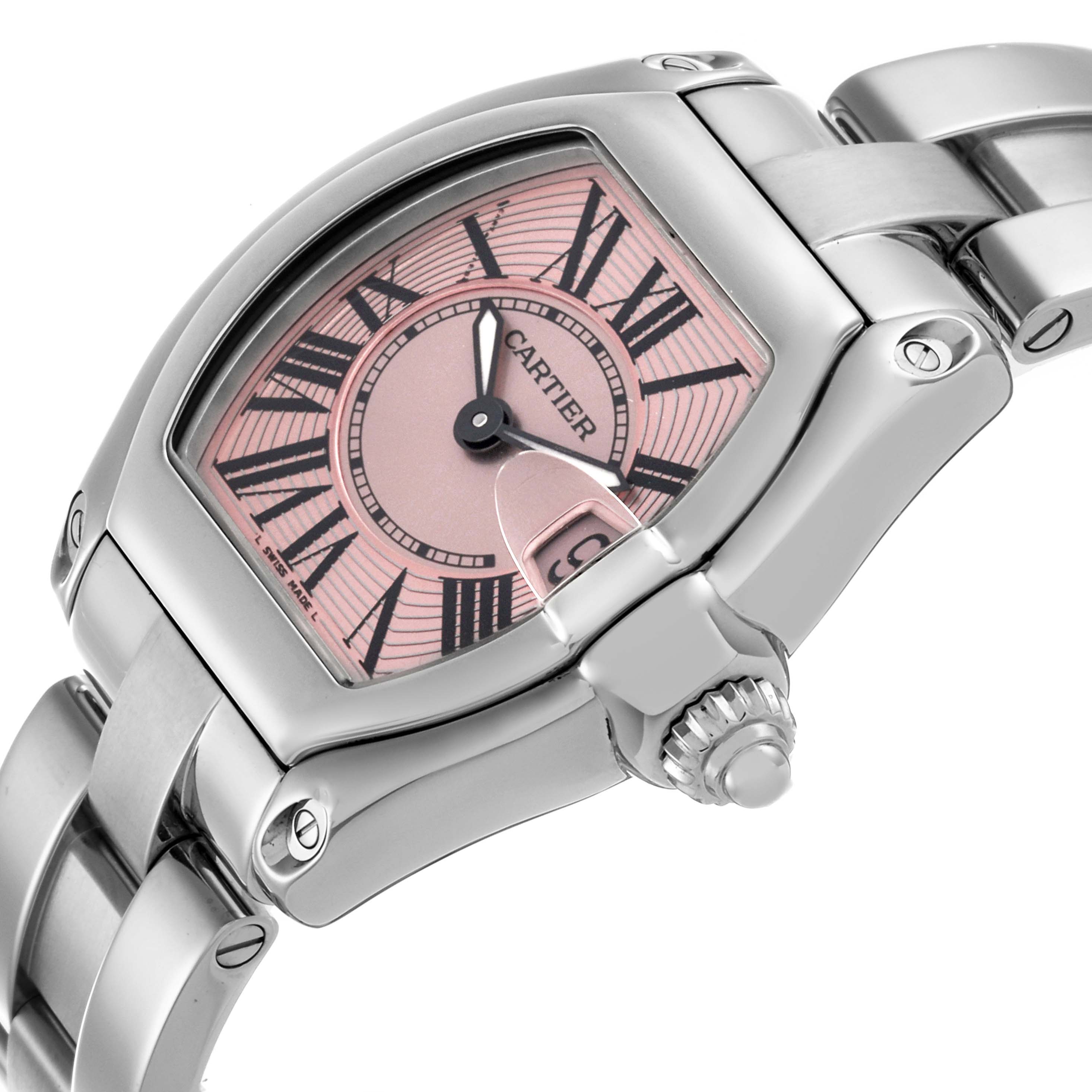 The Cartier Roadster W62017V3 Women's Stainless Steel Pink Dial W62017V3 Women's Stainless Steel Pink Dial watch is shown at an angled close-up, highlighting the dial, bezel, crown, and part of the bracelet.