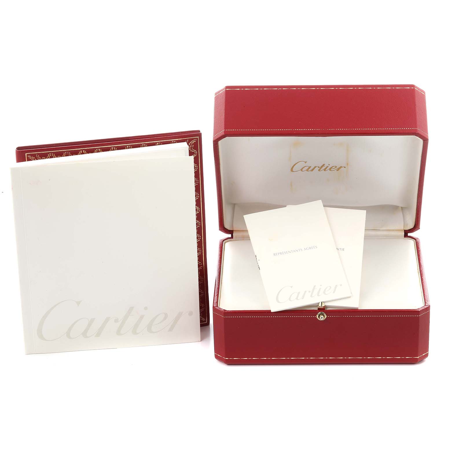 The image shows a Cartier Tank Française watch box and documentation from a frontal angle.