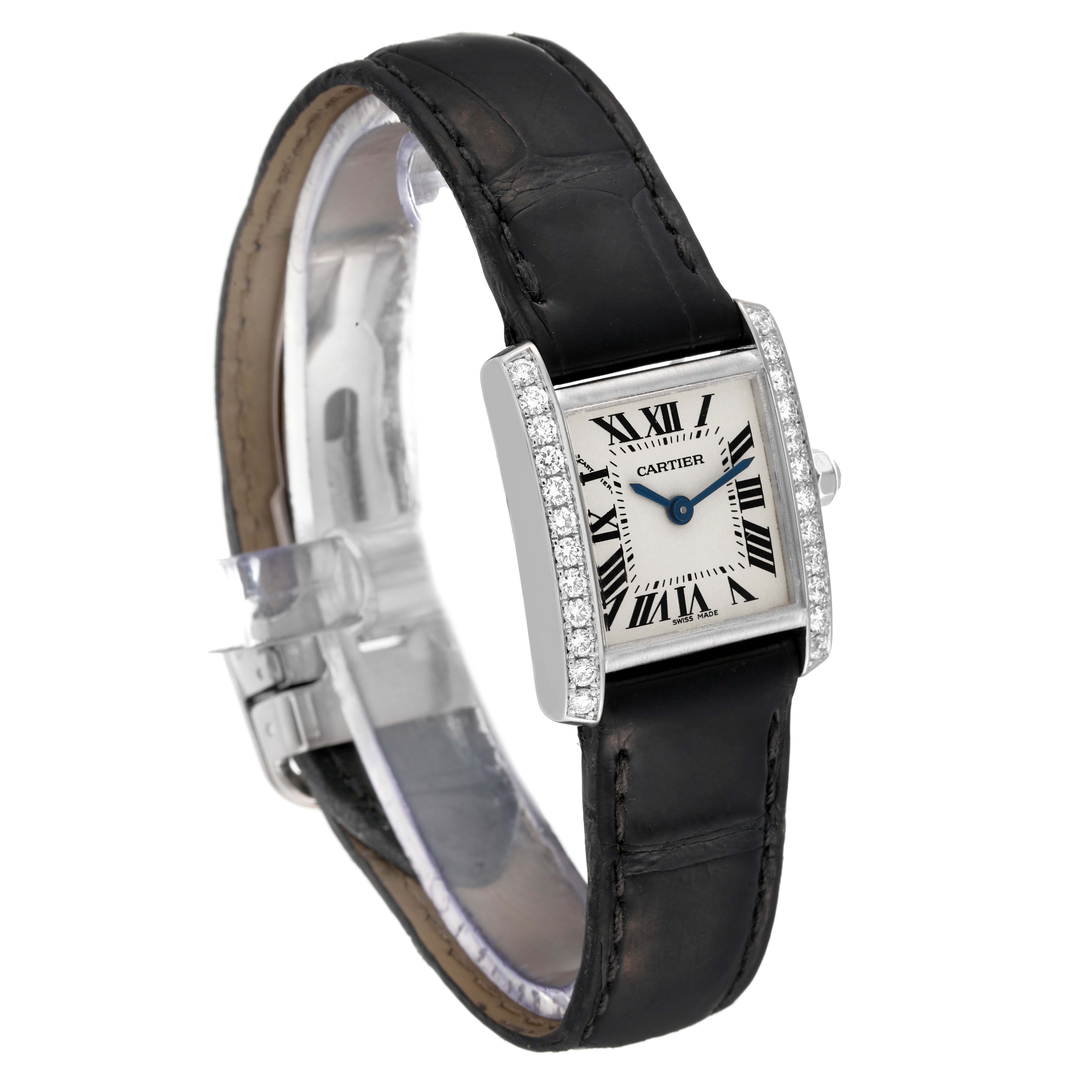 The image shows a Cartier Tank Francaise WE100251 Women
s White Gold Silver Dial WE100251 Women
s White Gold Silver Dial watch at a tilted angle, displaying the face, bezel, and leather strap.